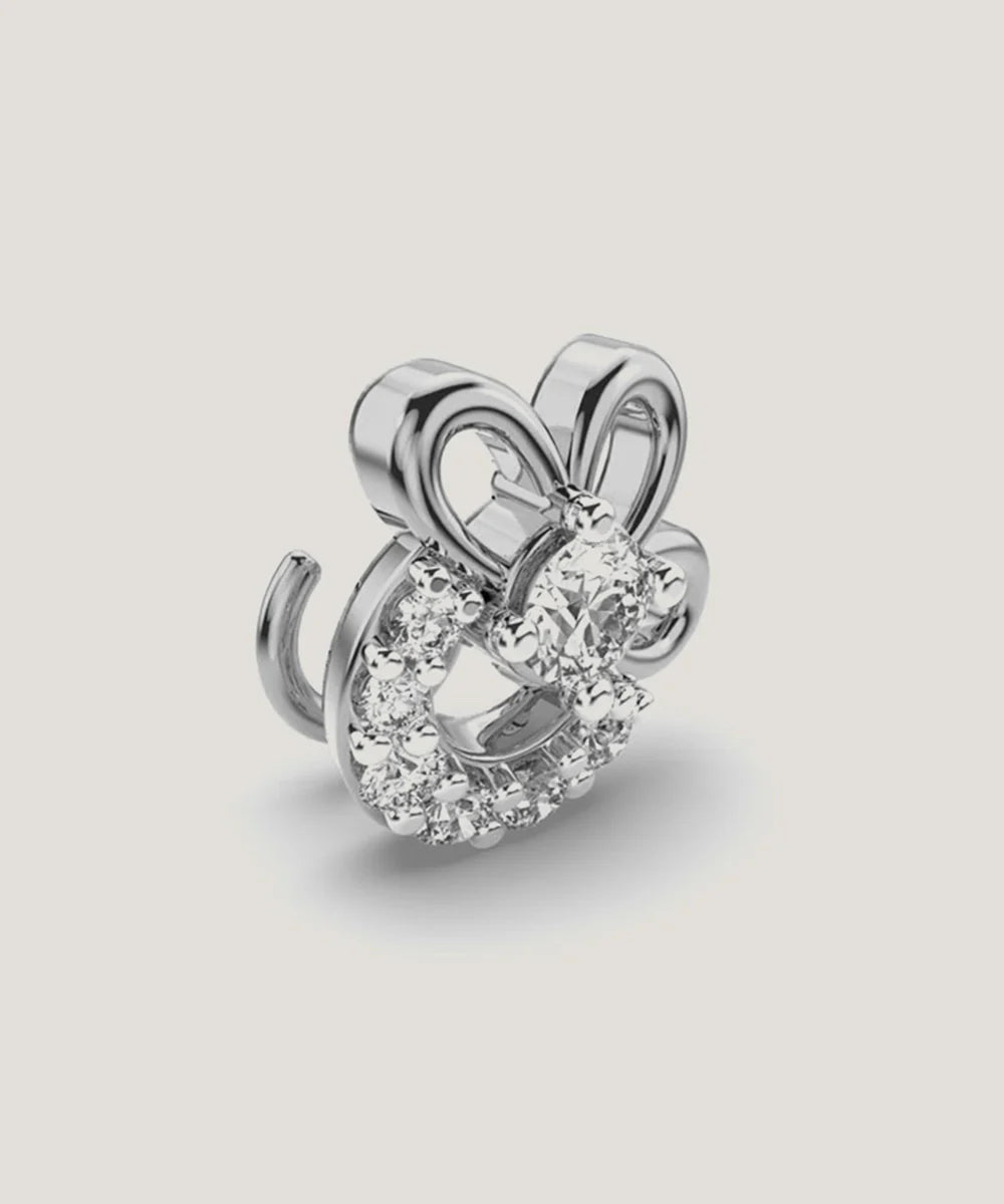 Peelerie jewelry piece in midnight luxury editorial product photo, high-contrast studio lighting