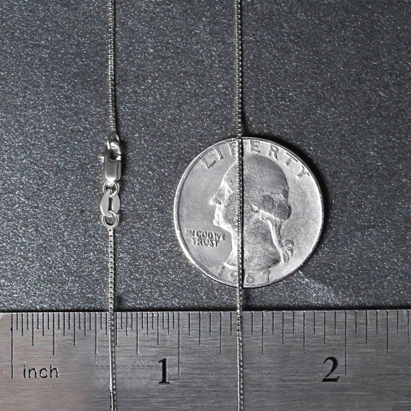 Peelerie jewelry piece in midnight luxury editorial product photo, high-contrast studio lighting