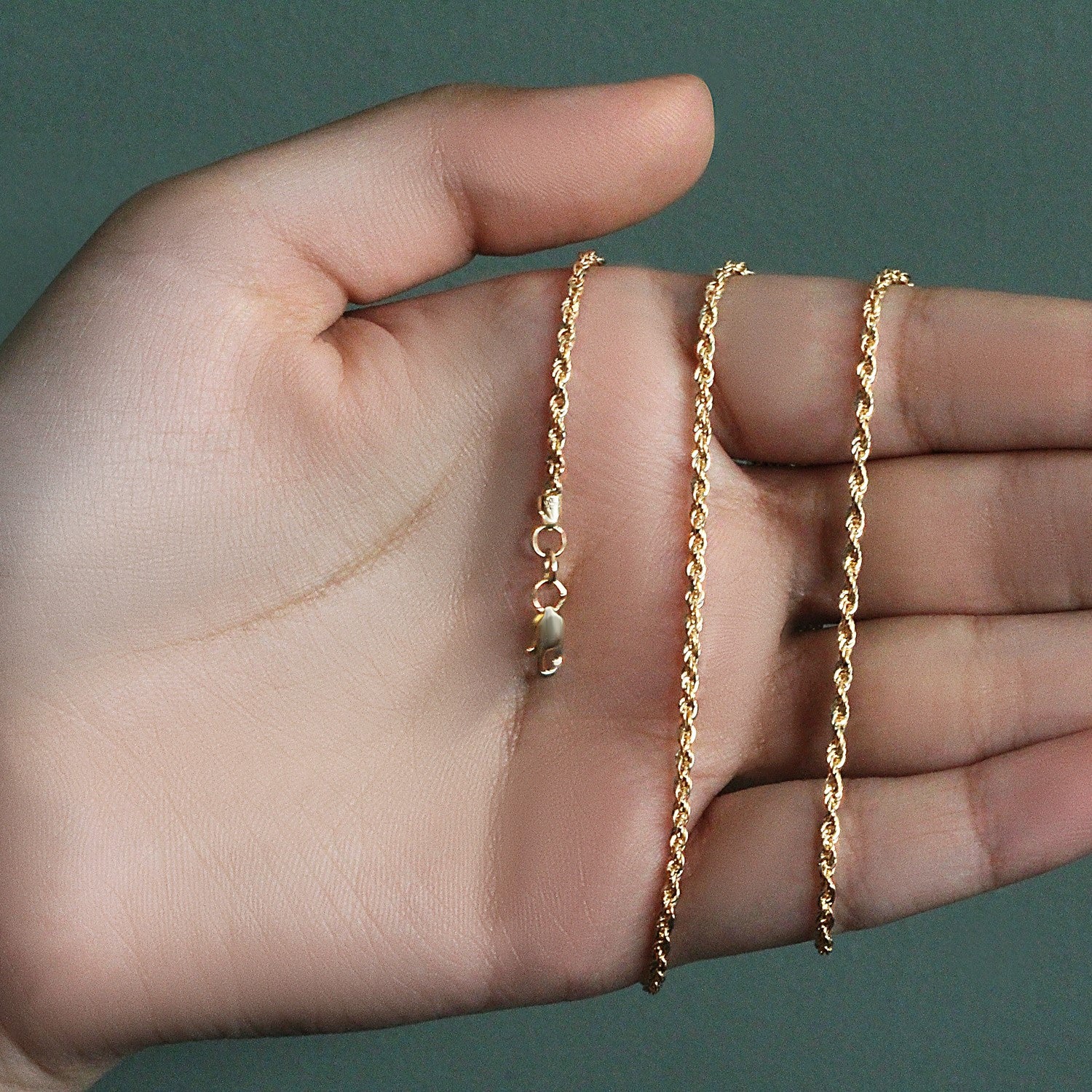 Peelerie jewelry piece in midnight luxury editorial product photo, high-contrast studio lighting