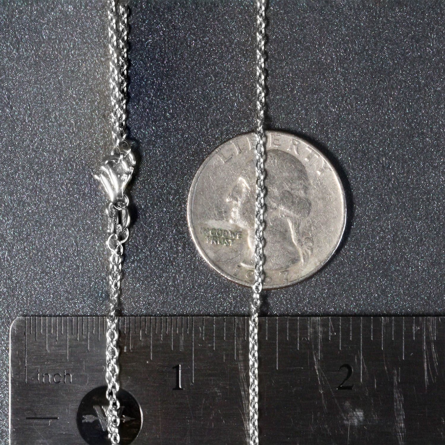 Peelerie jewelry piece in midnight luxury editorial product photo, high-contrast studio lighting