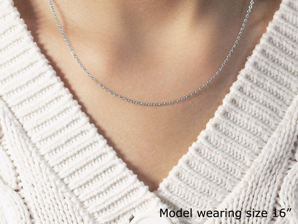 Peelerie jewelry piece in midnight luxury editorial product photo, high-contrast studio lighting