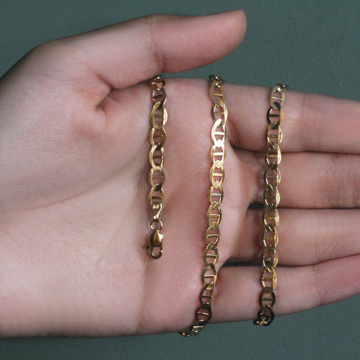 Peelerie jewelry piece in midnight luxury editorial product photo, high-contrast studio lighting