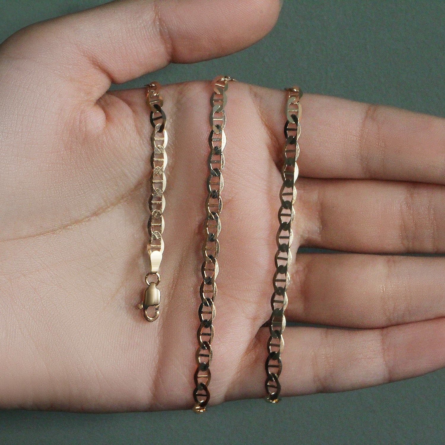 Peelerie jewelry piece in midnight luxury editorial product photo, high-contrast studio lighting