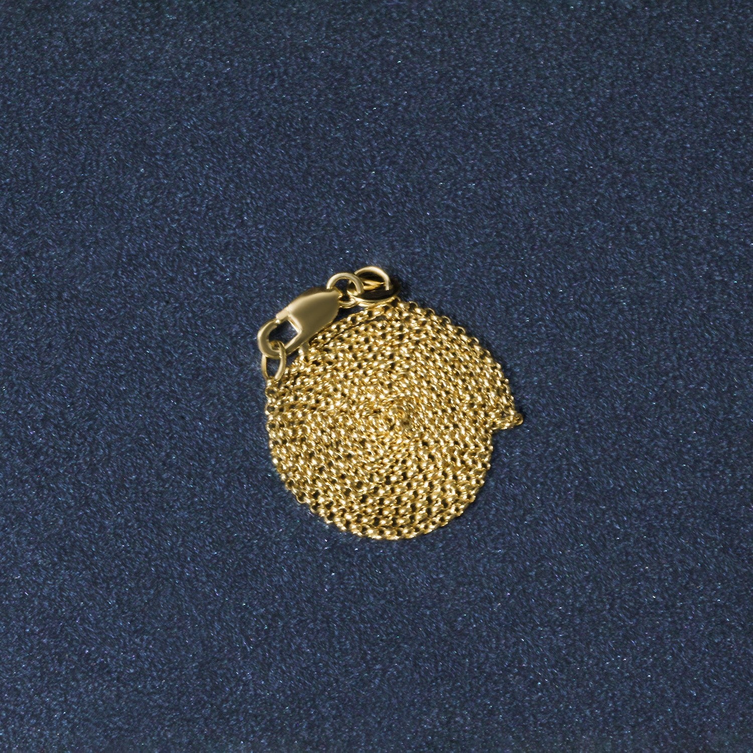 Peelerie jewelry piece in midnight luxury editorial product photo, high-contrast studio lighting