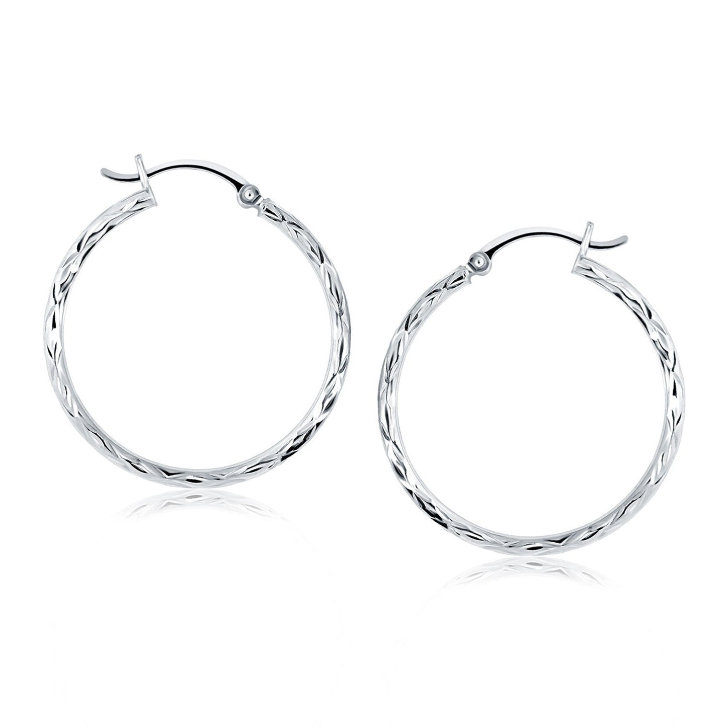 14k White Gold Diamond Cut Hoop Earrings(2x30mm) in a sleek high-contrast midnight luxury editorial style