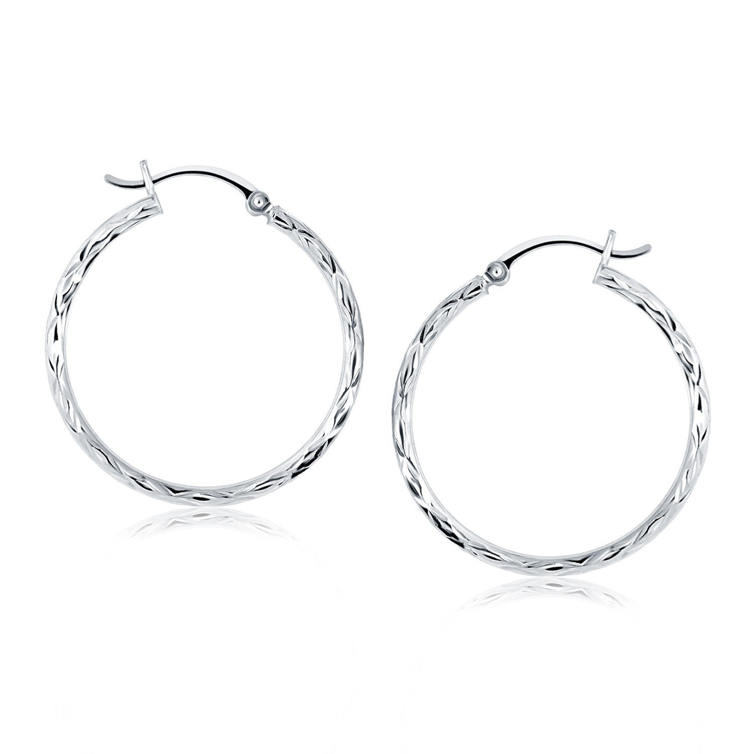 14k White Gold Diamond Cut Hoop Earrings(2x30mm) in a sleek high-contrast midnight luxury editorial style