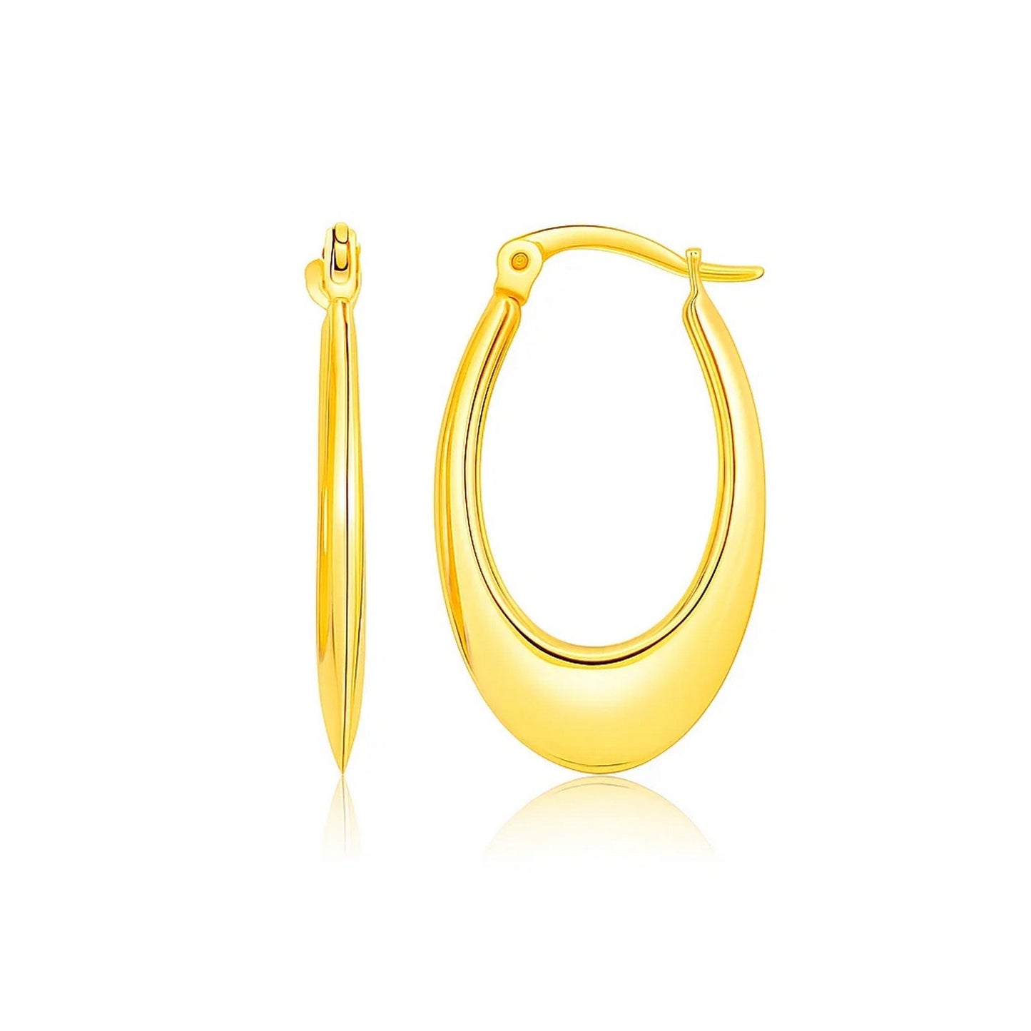 14k Yellow Gold Puffed Graduated Open Oval Earrings in a sleek high-contrast midnight luxury editorial style