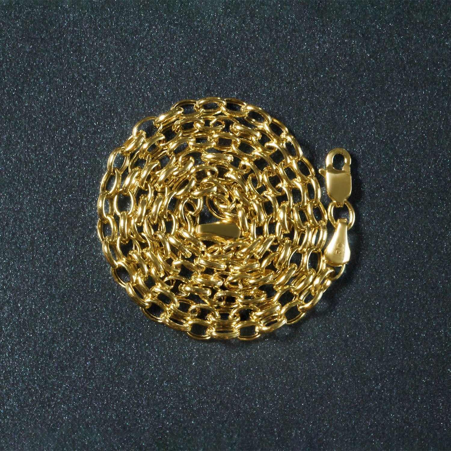 Peelerie jewelry piece in midnight luxury editorial product photo, high-contrast studio lighting