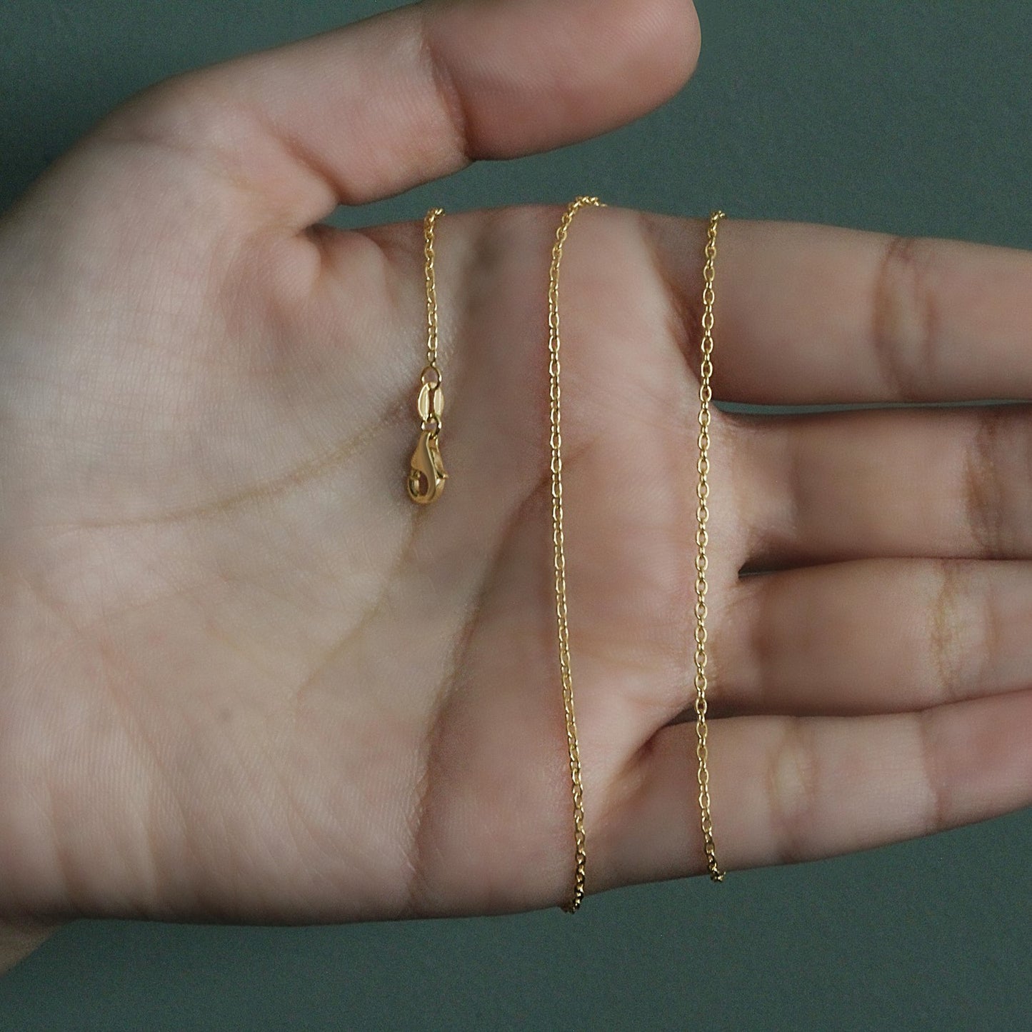 Peelerie jewelry piece in midnight luxury editorial product photo, high-contrast studio lighting