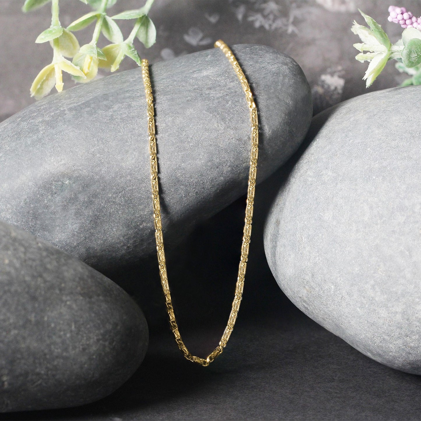 Peelerie jewelry piece in gold midnight luxury editorial product photo, high-contrast studio lighting