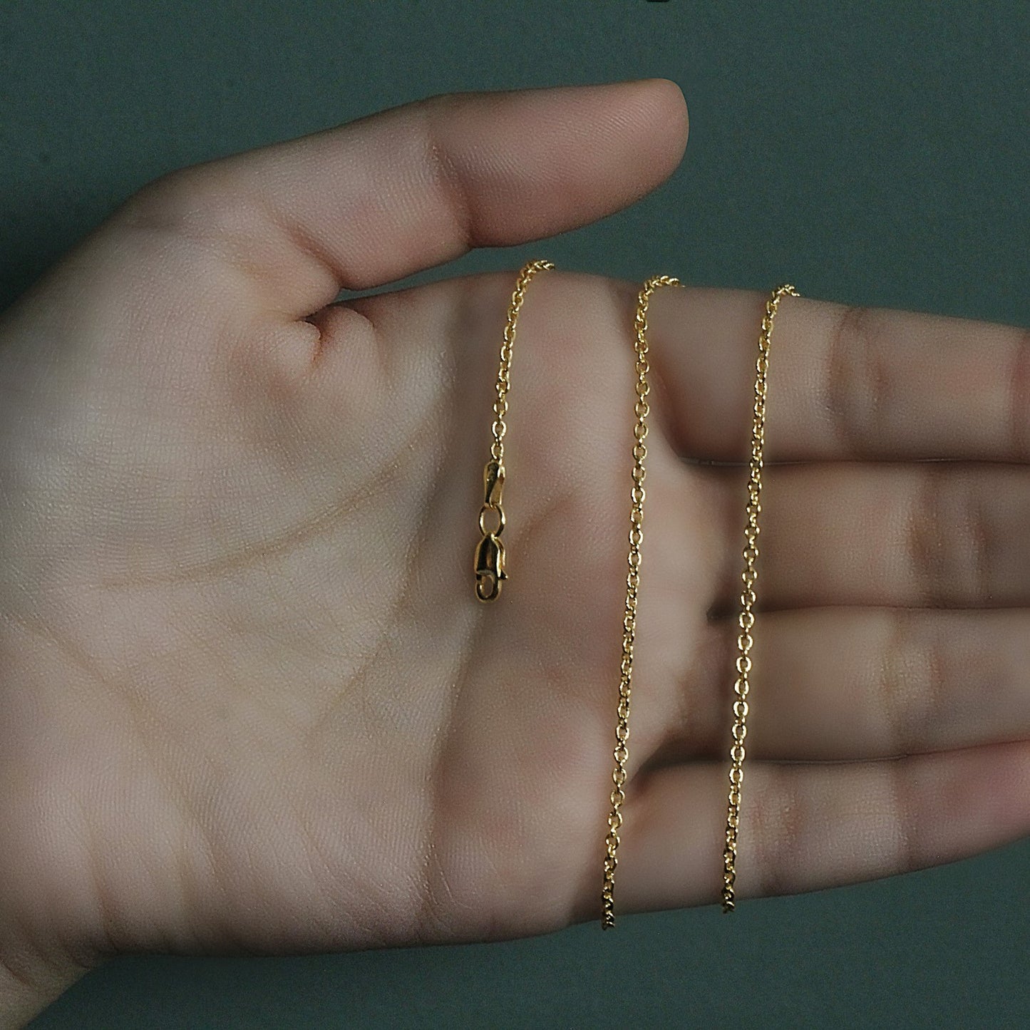 Peelerie jewelry piece in midnight luxury editorial product photo, high-contrast studio lighting