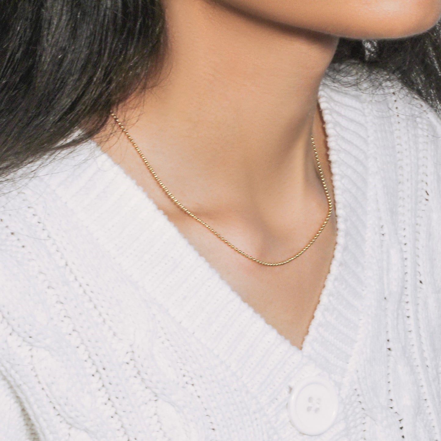 Peelerie jewelry piece in midnight luxury editorial product photo, high-contrast studio lighting