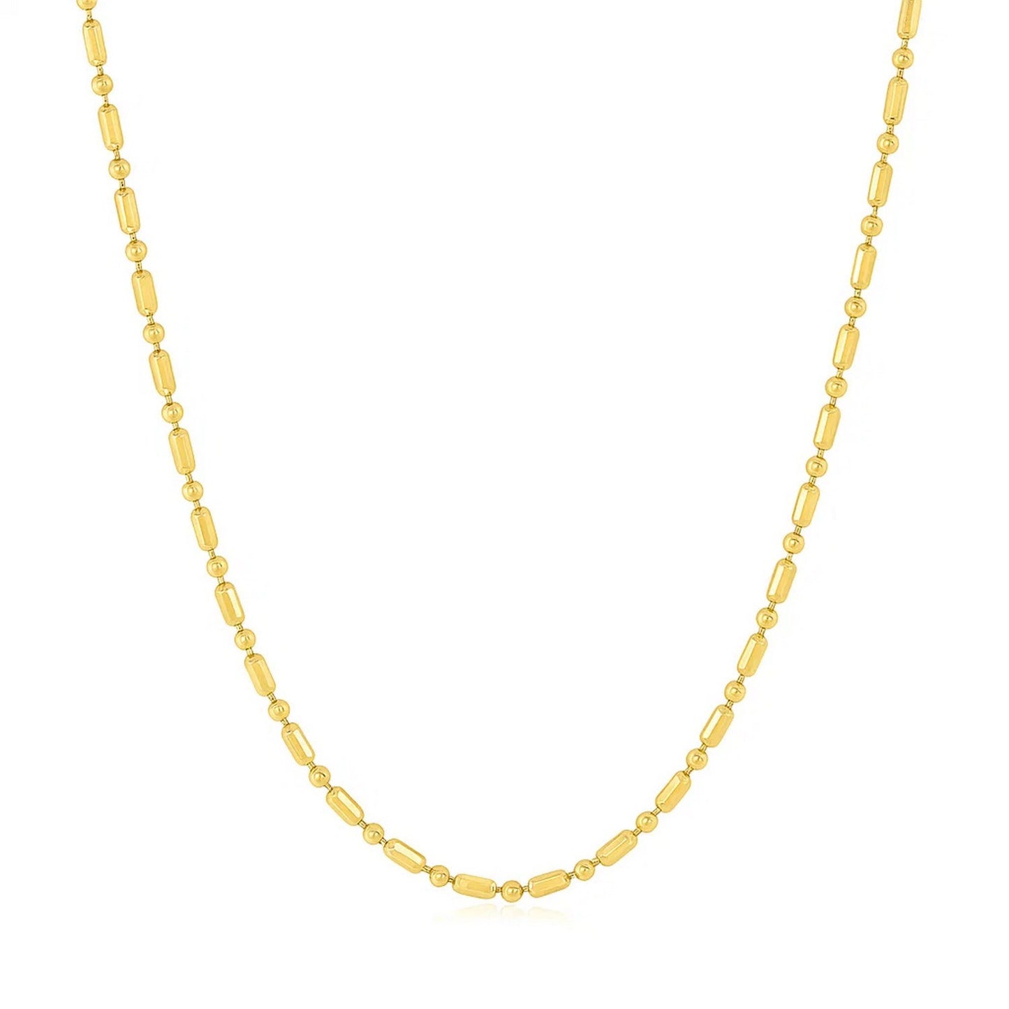 14k Yellow Gold Diamond-Cut Alternating Bead Chain (1.30 mm) in a sleek high-contrast midnight luxury editorial style