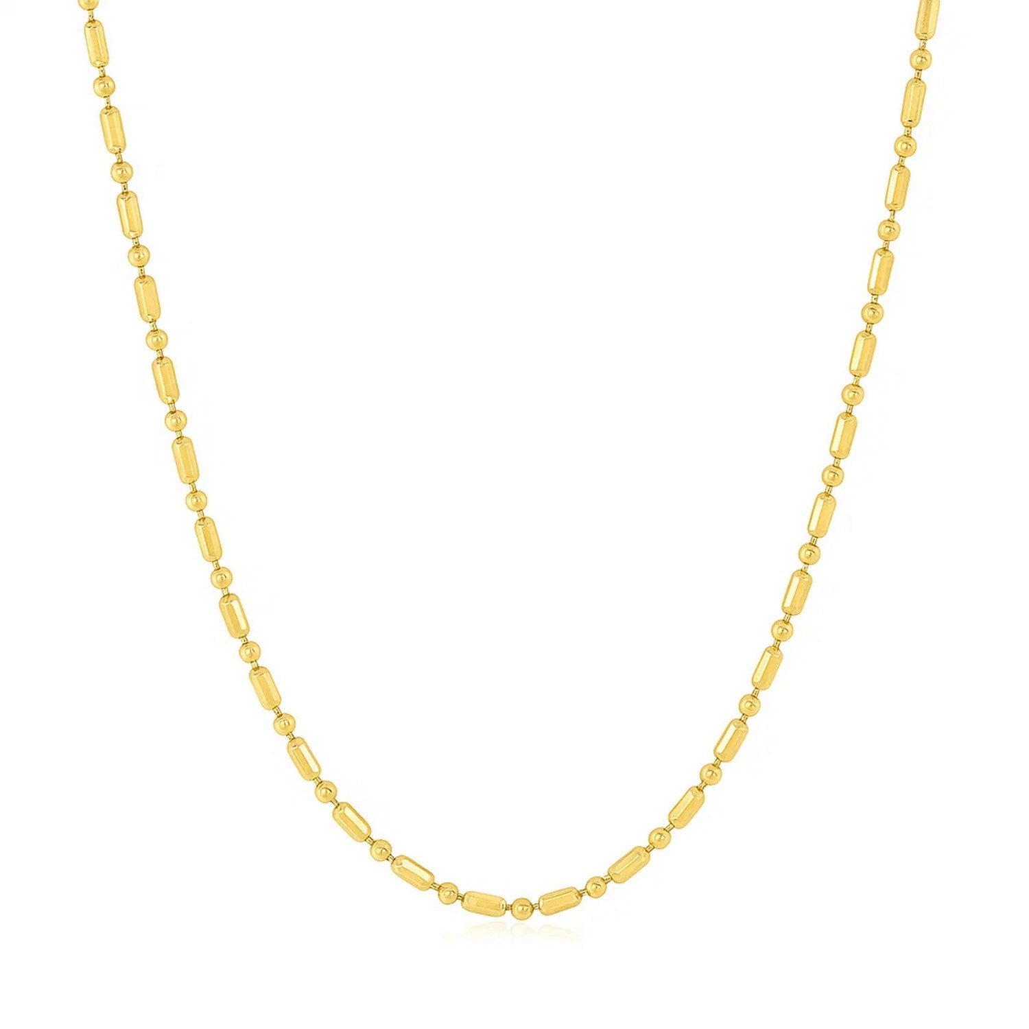 14k Yellow Gold Diamond-Cut Alternating Bead Chain (1.30 mm) in a sleek high-contrast midnight luxury editorial style