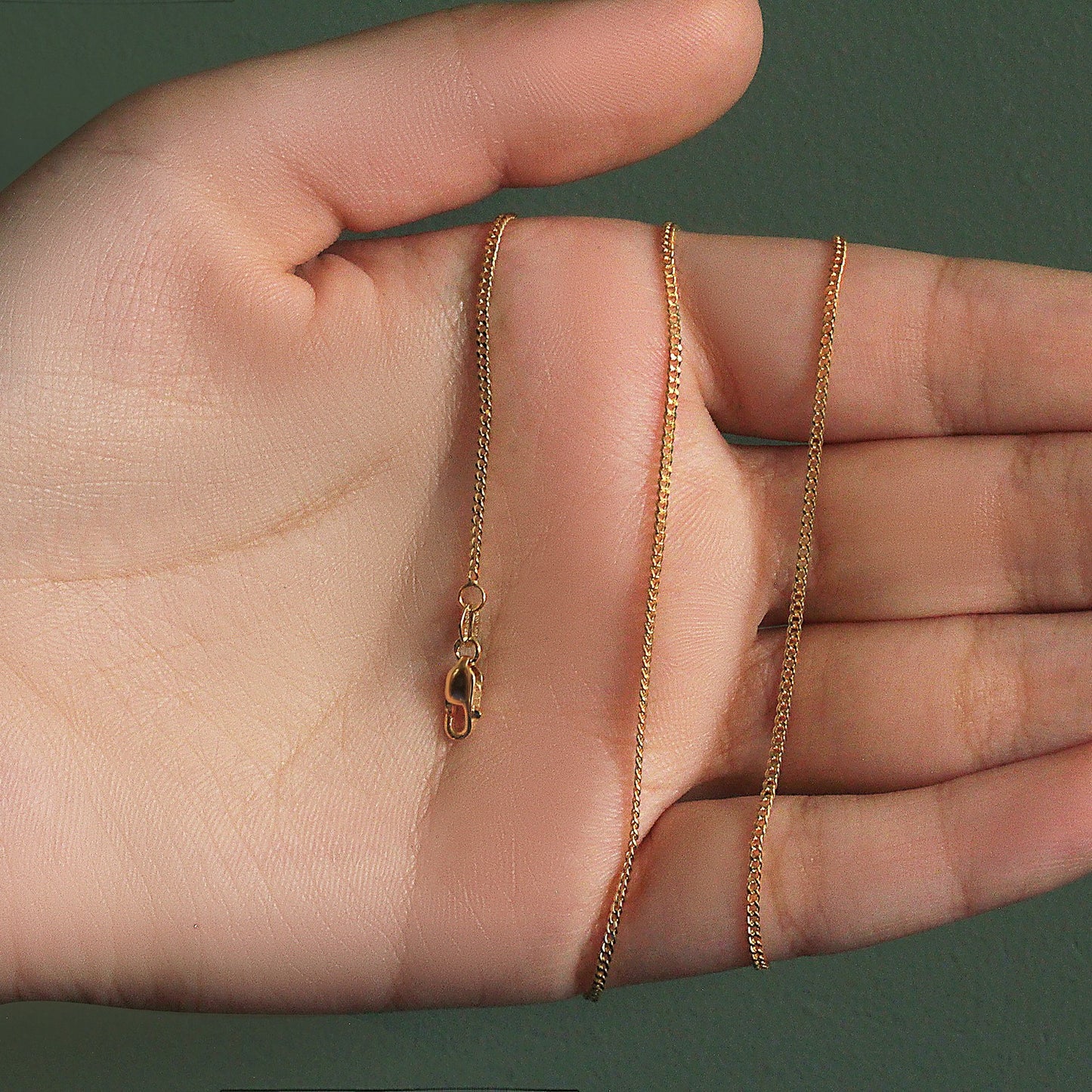 Peelerie jewelry piece in midnight luxury editorial product photo, high-contrast studio lighting