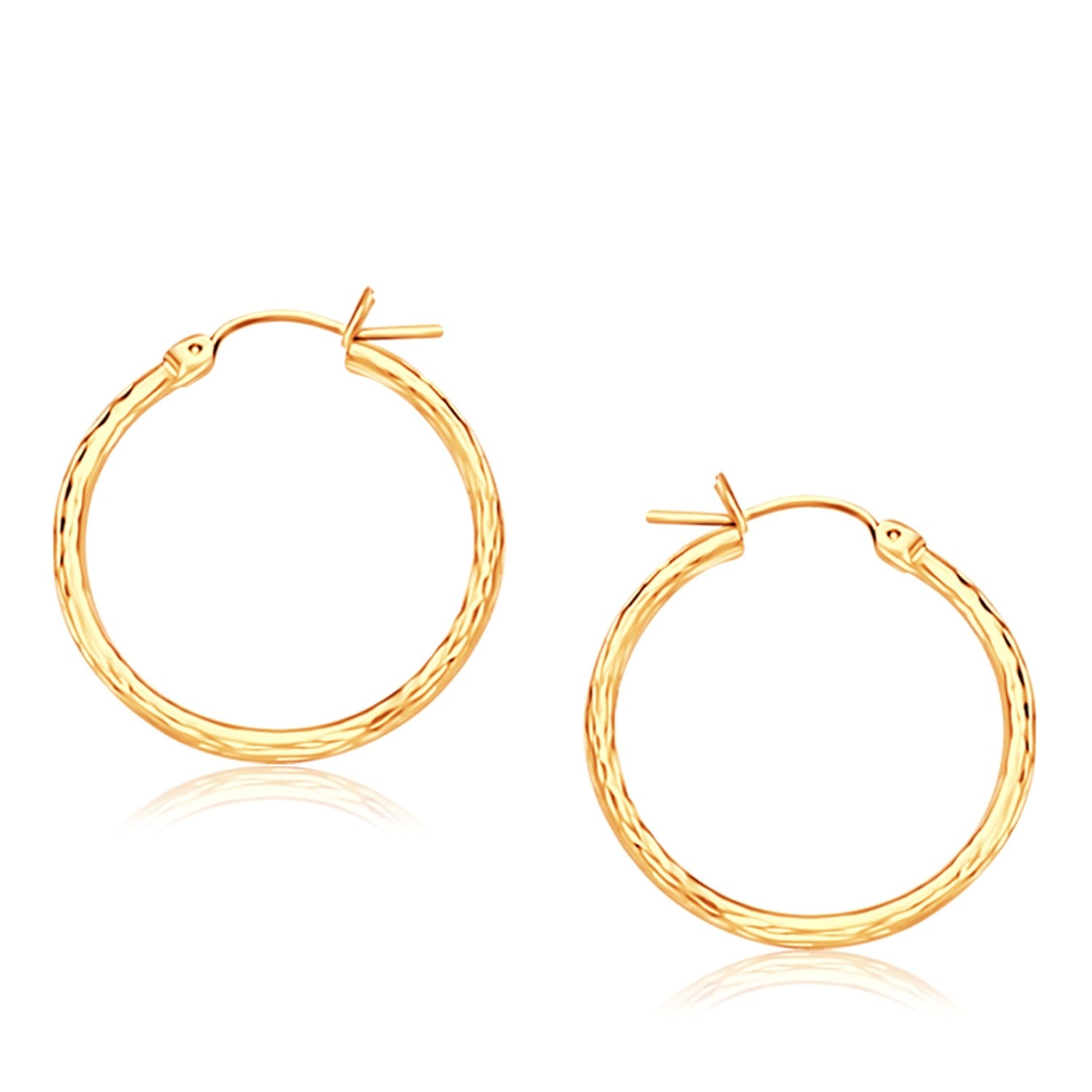14K Yellow Gold Diamond Cut Hoop Earrings (25mm Diameter) in a sleek high-contrast midnight luxury editorial style