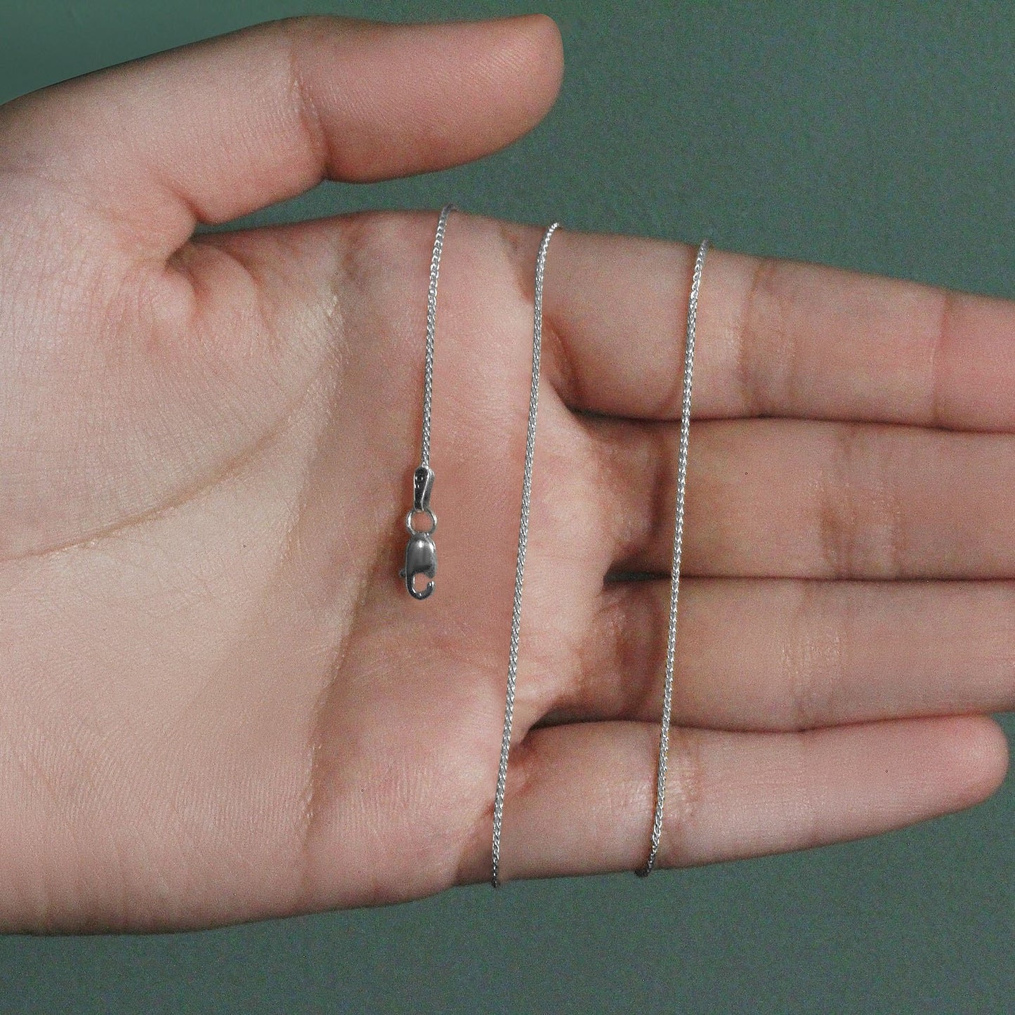 Peelerie jewelry piece in midnight luxury editorial product photo, high-contrast studio lighting