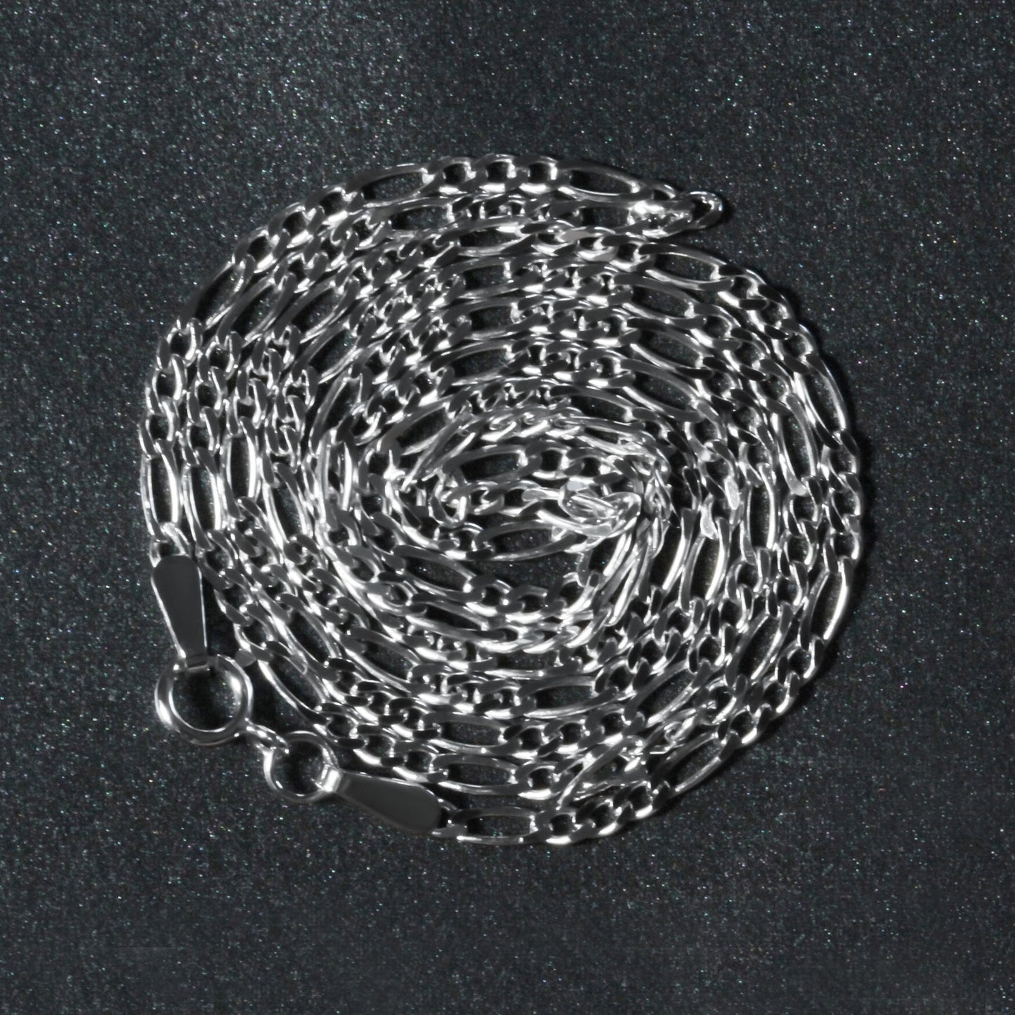 Peelerie jewelry piece in midnight luxury editorial product photo, high-contrast studio lighting