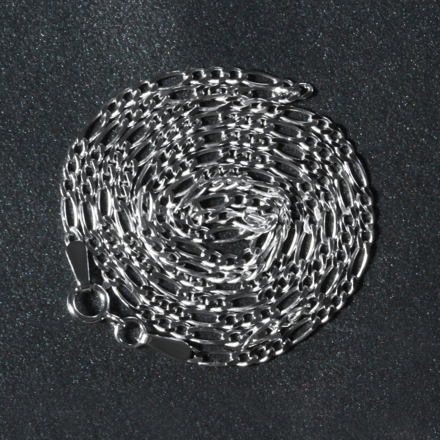 Peelerie jewelry piece in midnight luxury editorial product photo, high-contrast studio lighting