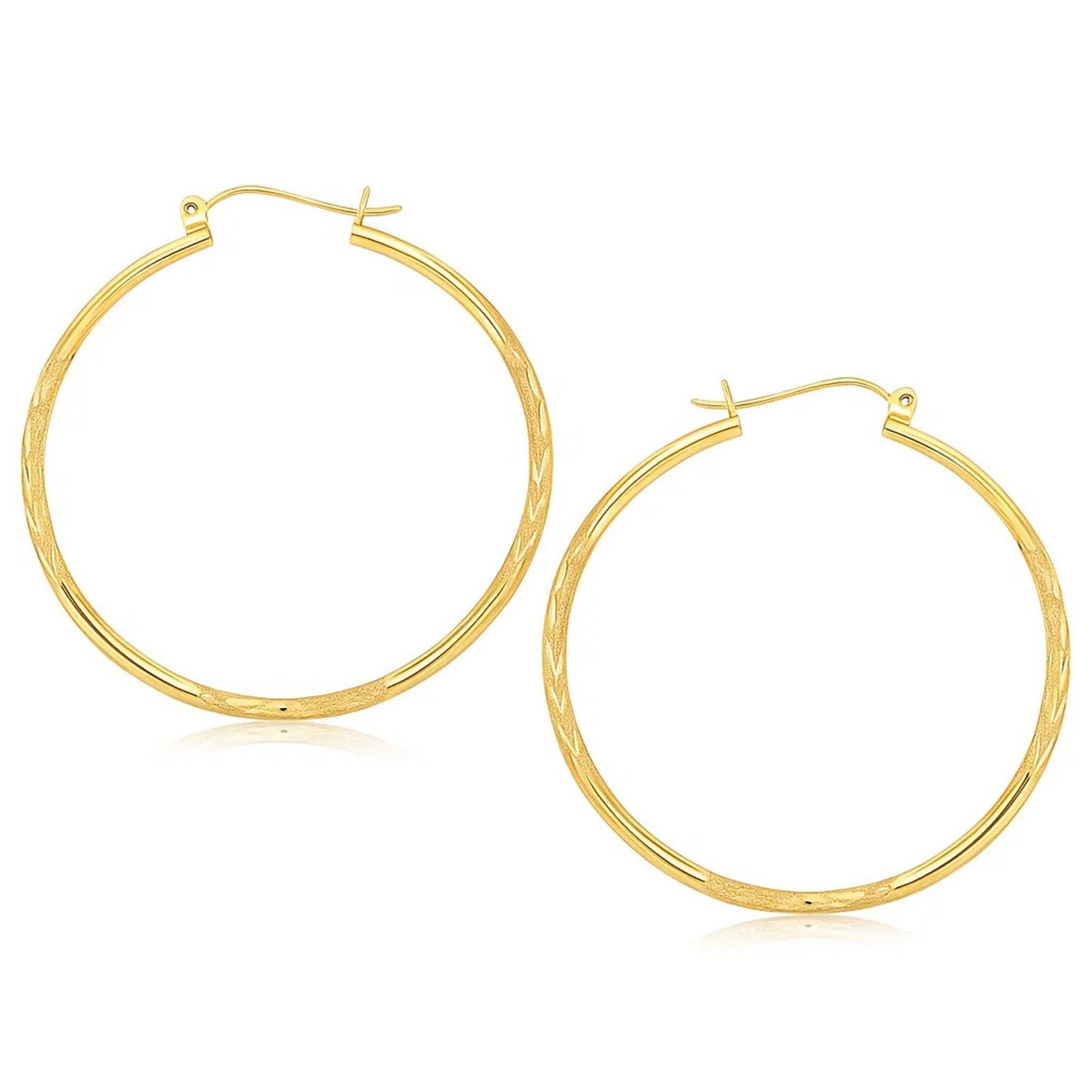 14k Yellow Gold Fancy Diamond Cut Extra Large Hoop Earrings (2x45mm) in a sleek high-contrast midnight luxury editorial style