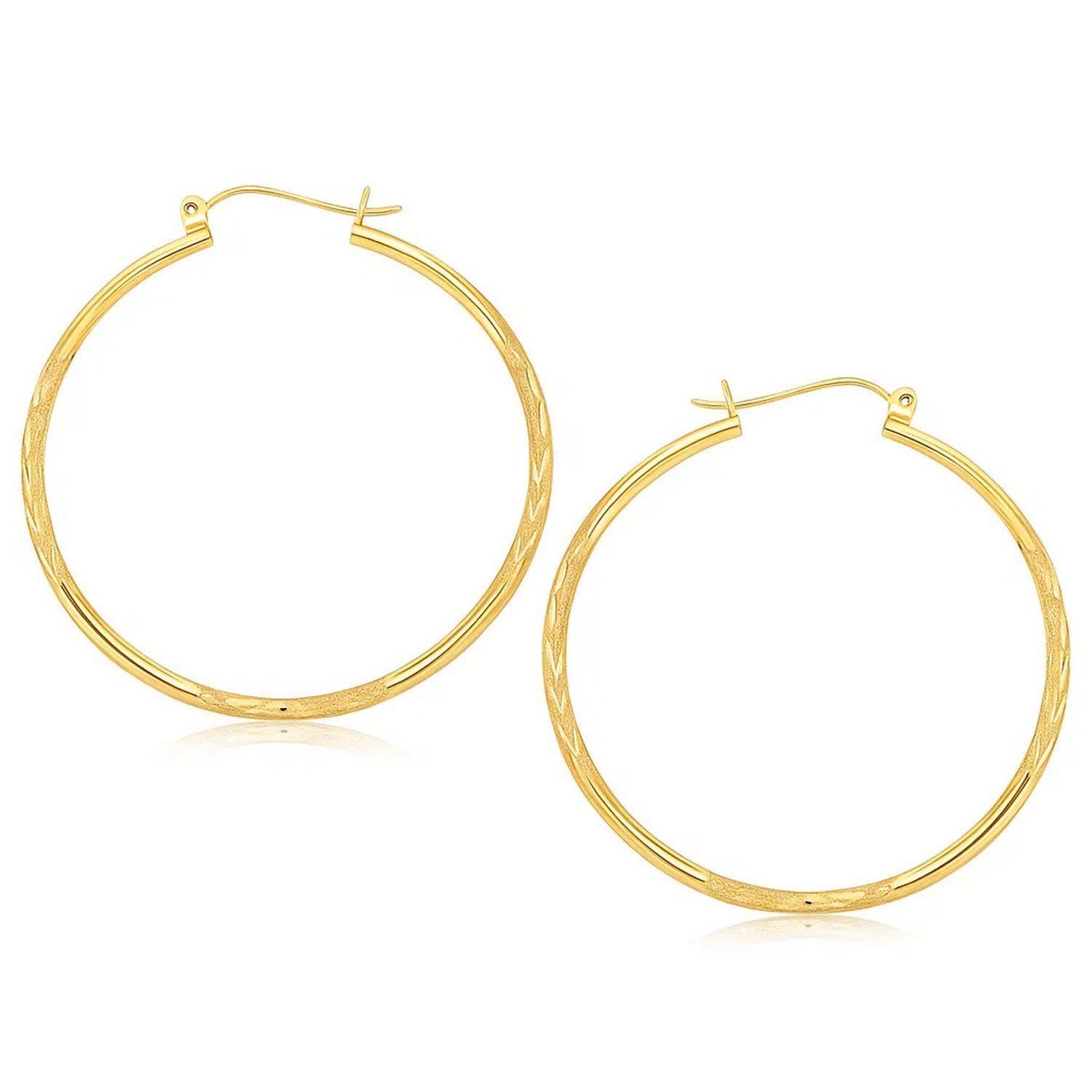 14k Yellow Gold Fancy Diamond Cut Extra Large Hoop Earrings (2x45mm) in a sleek high-contrast midnight luxury editorial style