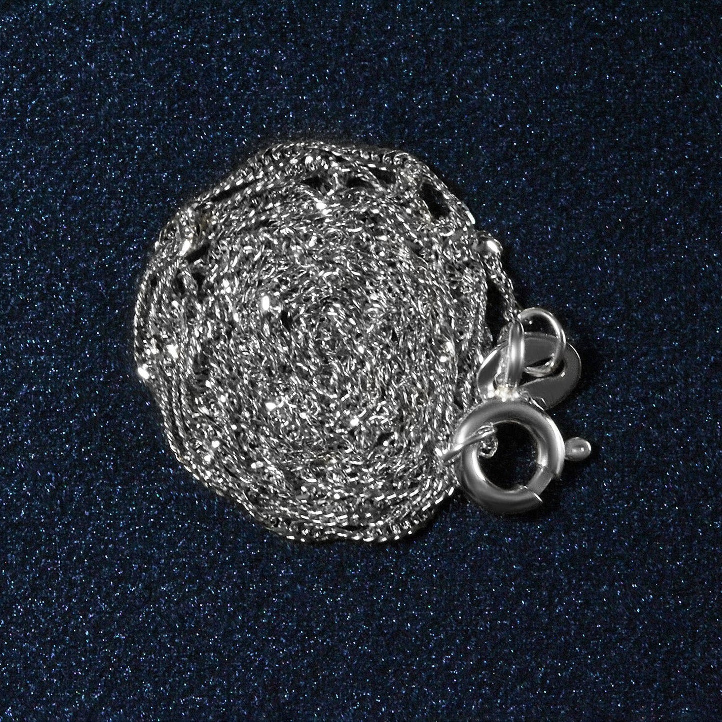 Peelerie jewelry piece in midnight luxury editorial product photo, high-contrast studio lighting