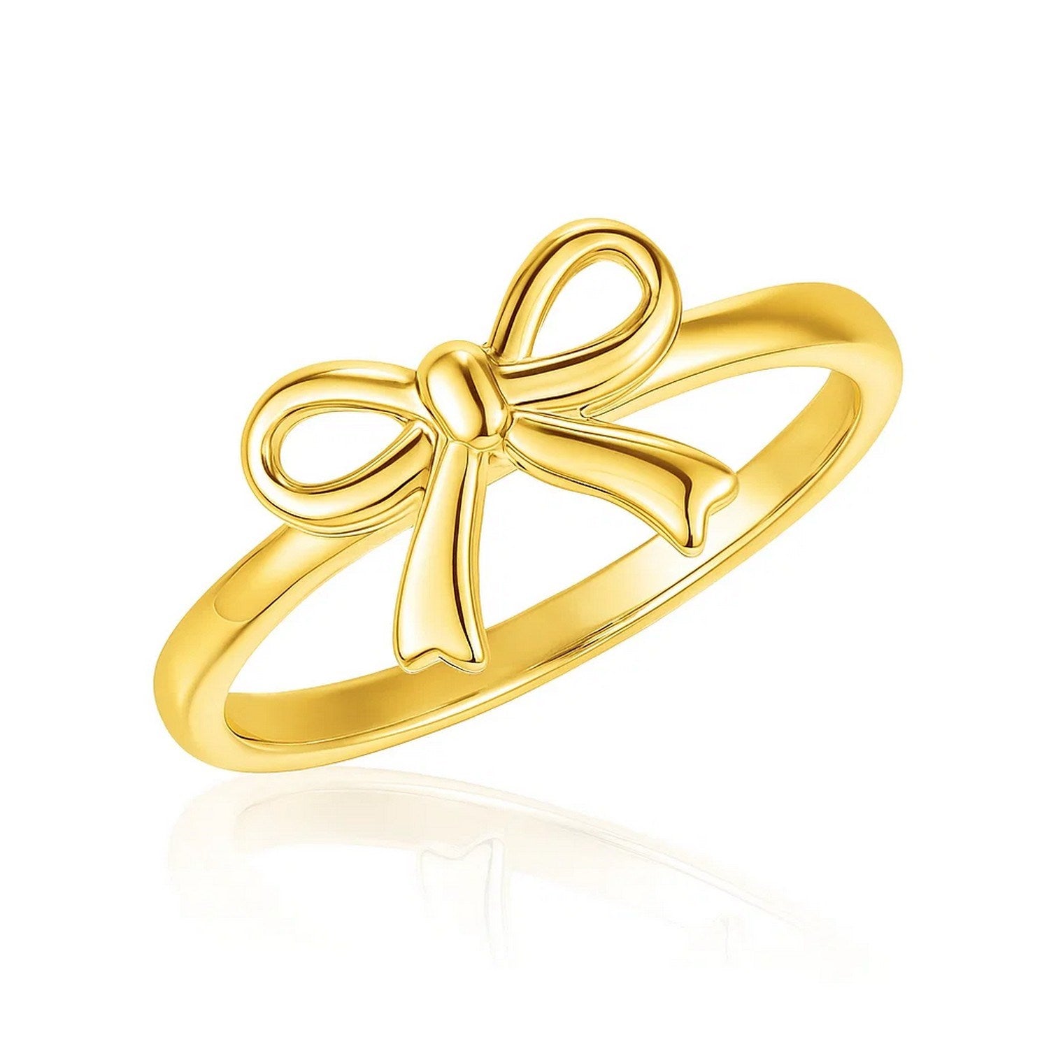 14k Yellow Gold Bow Ring in a sleek high-contrast midnight luxury editorial style