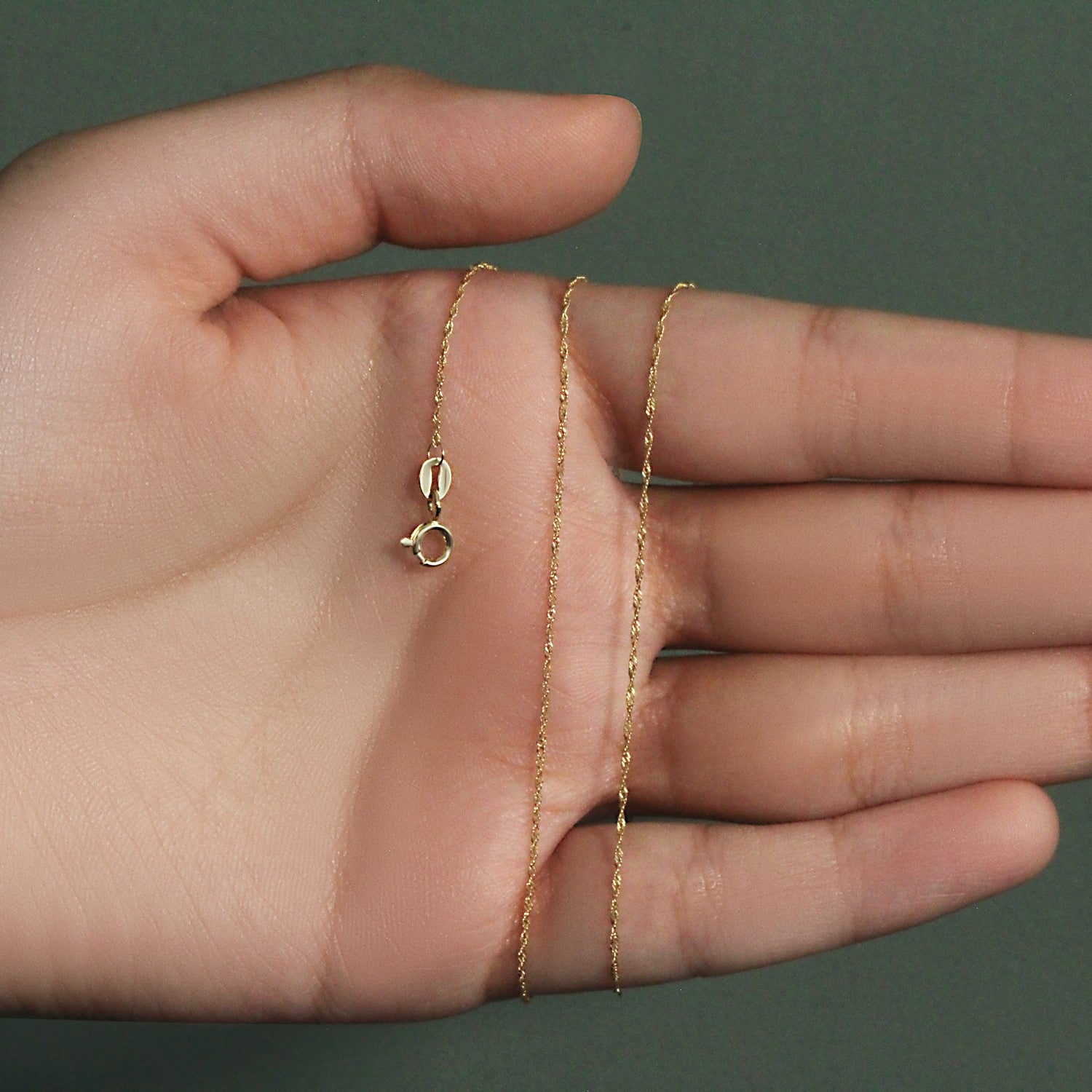 Peelerie jewelry piece in midnight luxury editorial product photo, high-contrast studio lighting