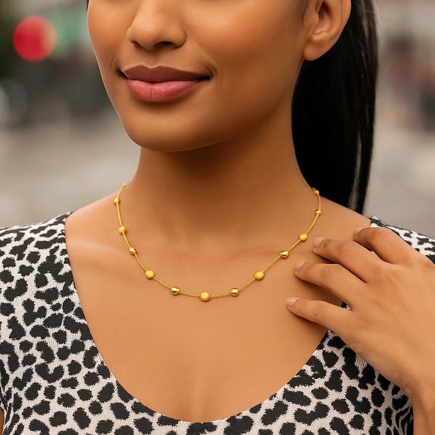 14k Yellow Gold Necklace with Polished and Textured Pebble Stations