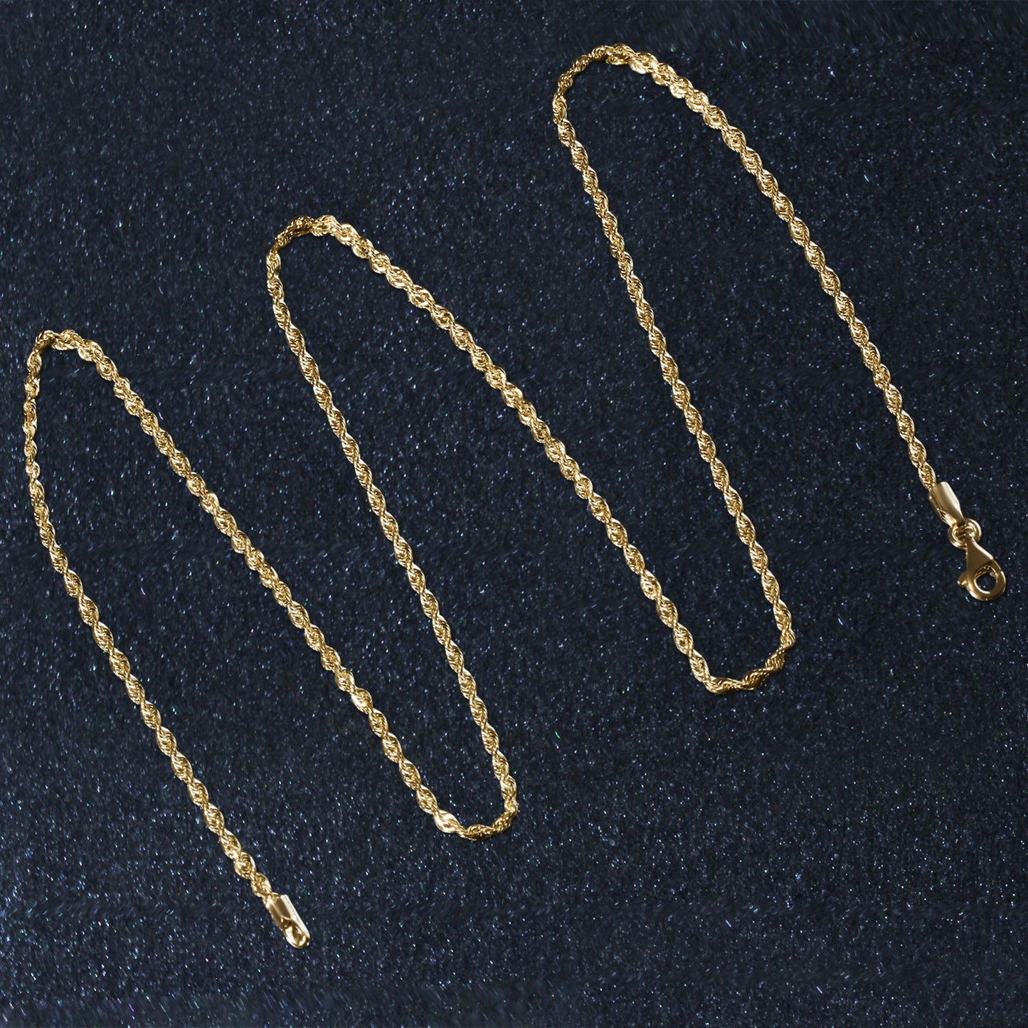 Peelerie jewelry piece in gold midnight luxury editorial product photo, high-contrast studio lighting