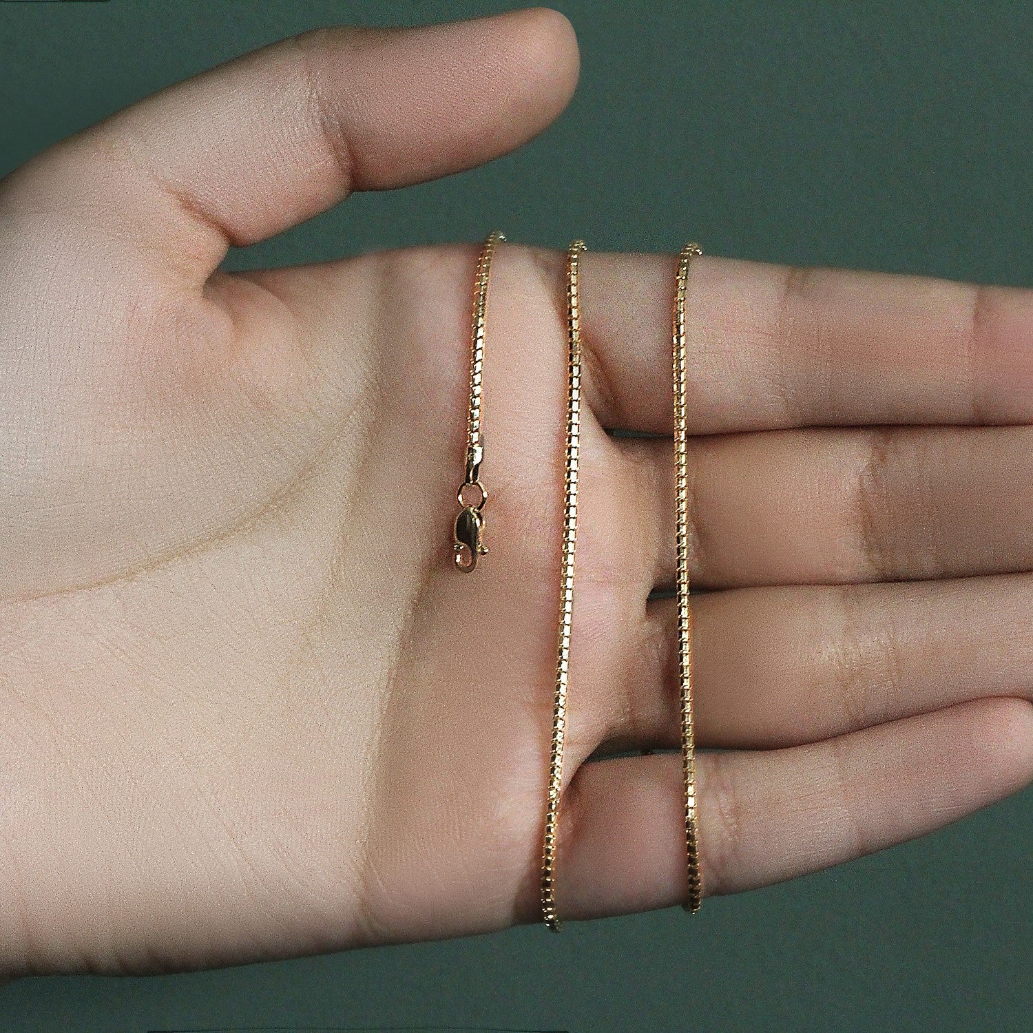 Peelerie jewelry piece in midnight luxury editorial product photo, high-contrast studio lighting