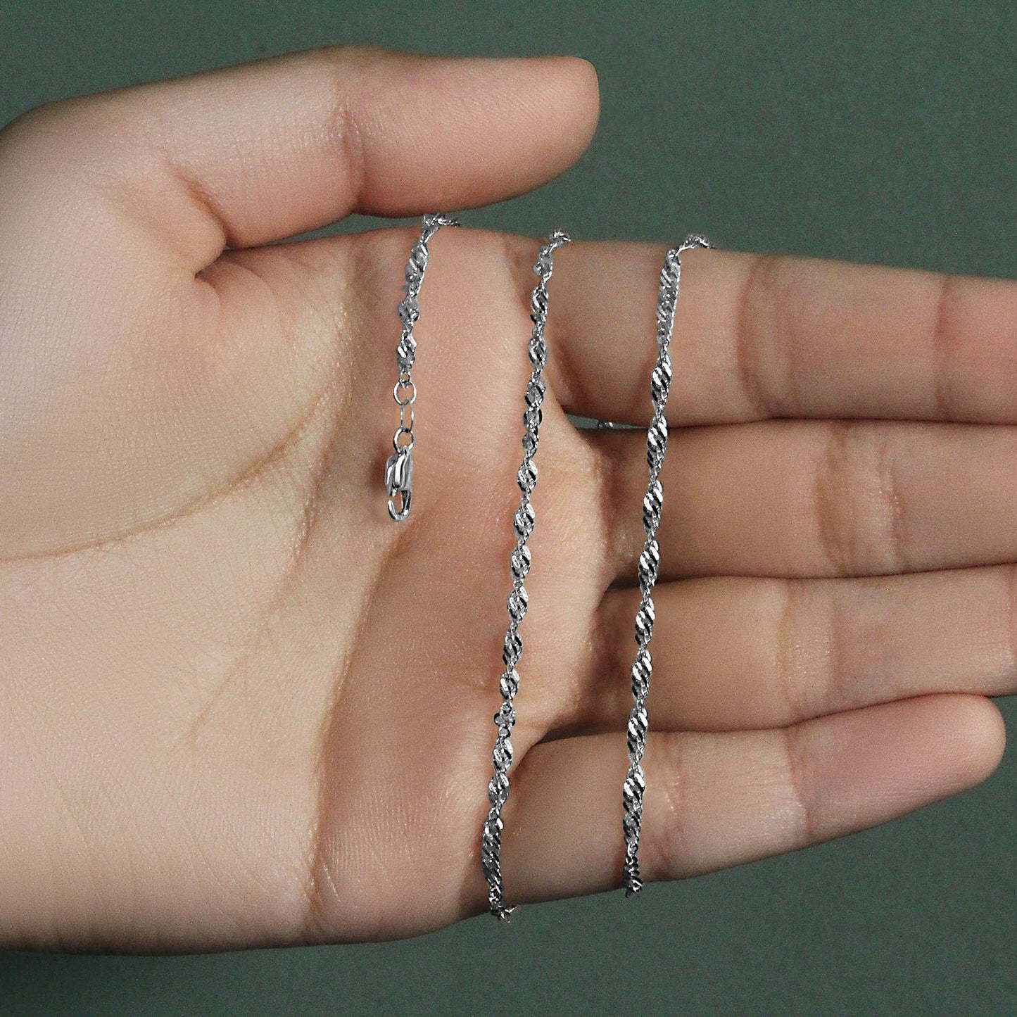 Peelerie jewelry piece in midnight luxury editorial product photo, high-contrast studio lighting