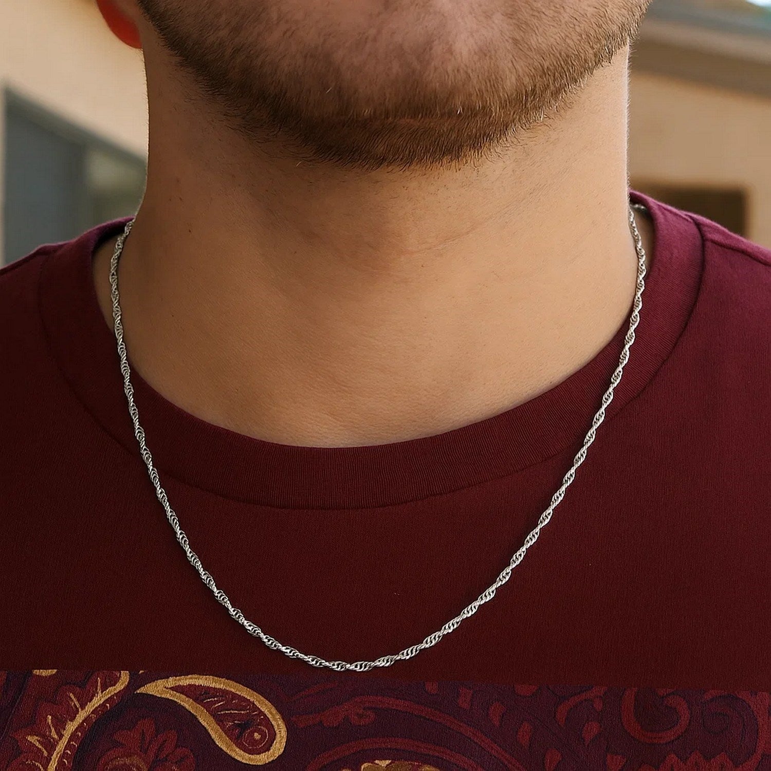 Peelerie jewelry piece in midnight luxury editorial product photo, high-contrast studio lighting