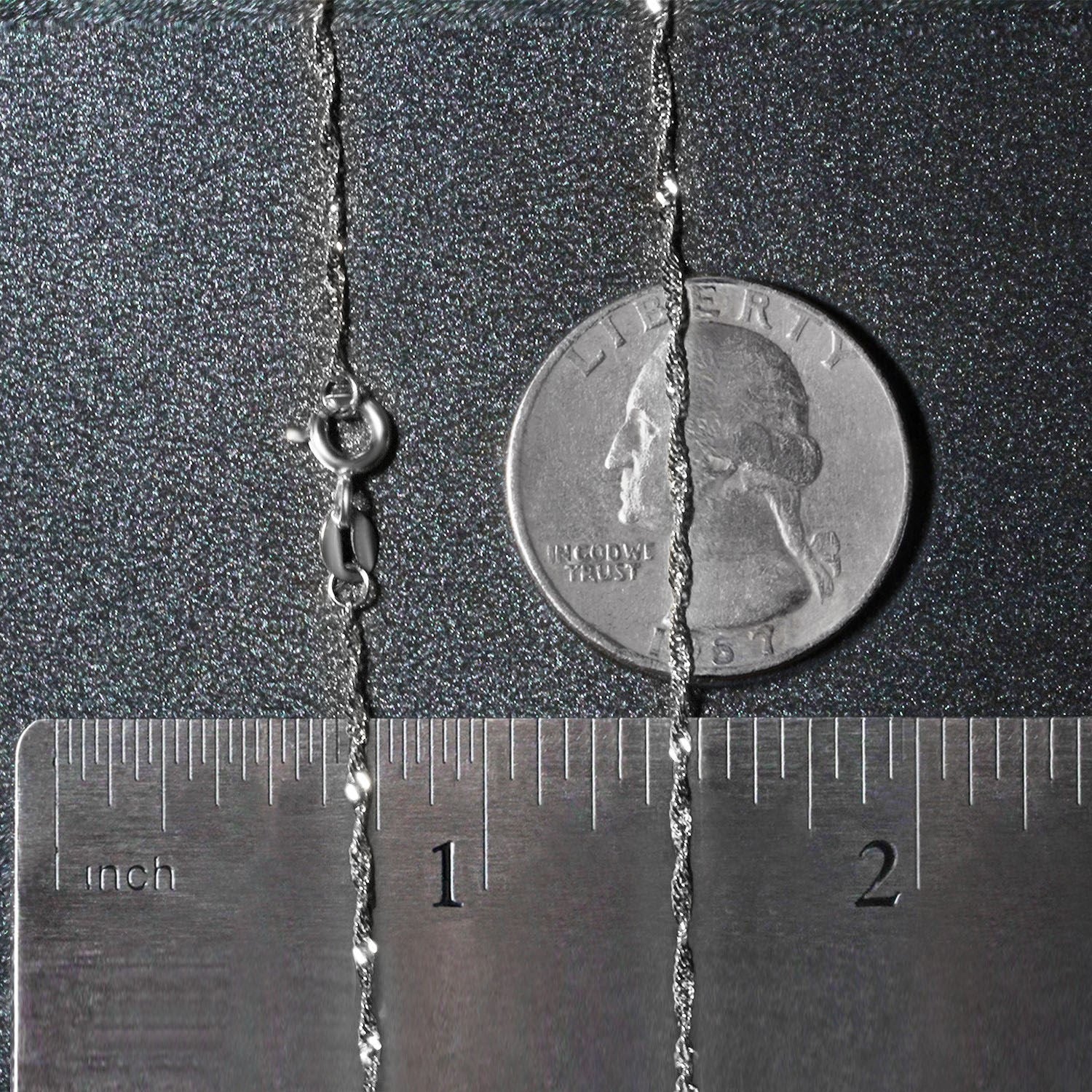 Peelerie jewelry piece in midnight luxury editorial product photo, high-contrast studio lighting