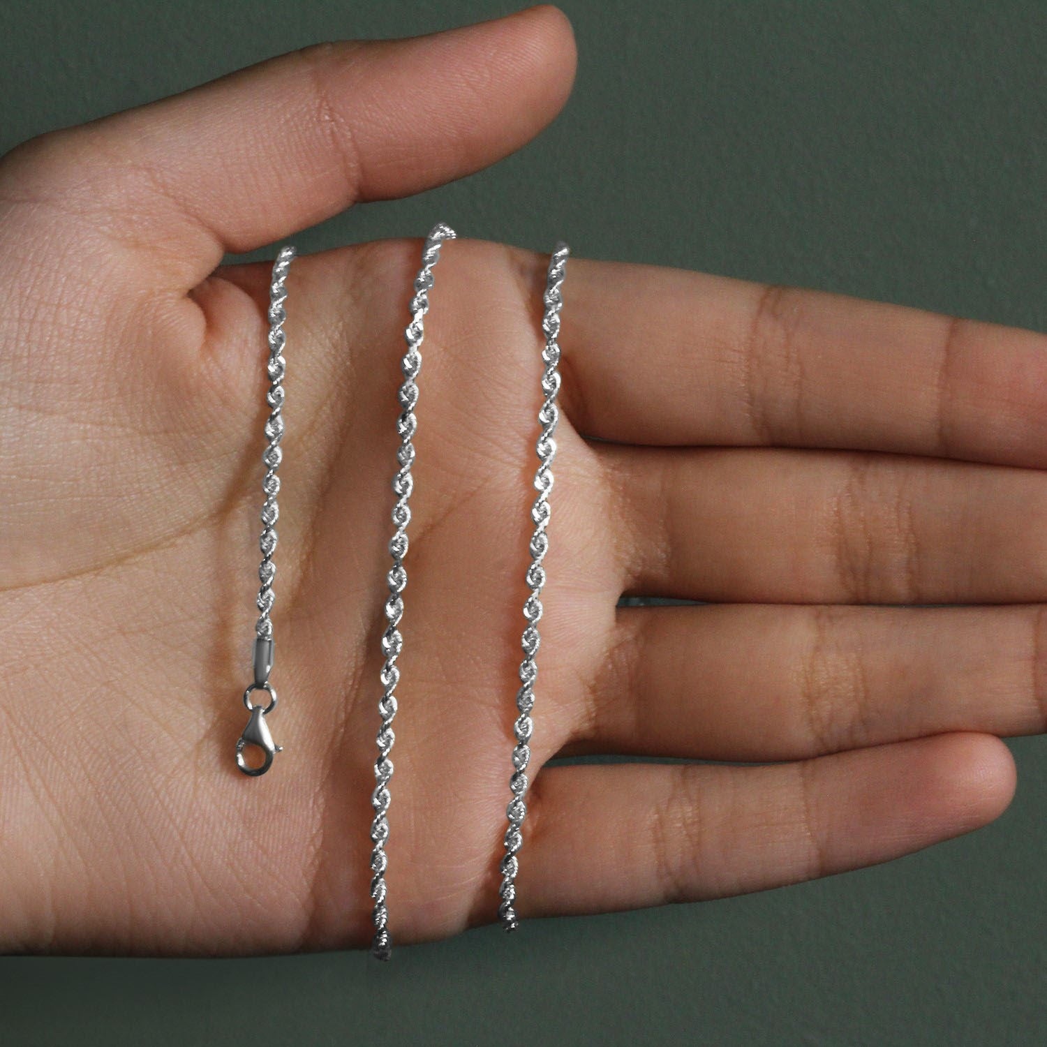 Peelerie jewelry piece in midnight luxury editorial product photo, high-contrast studio lighting