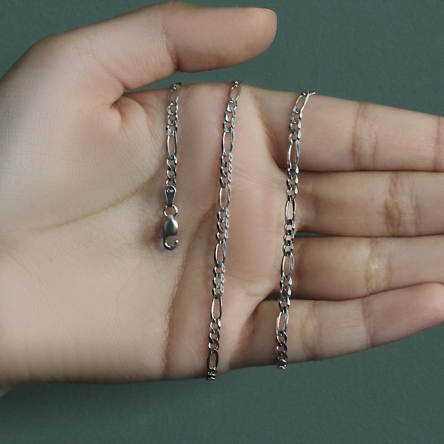 Peelerie jewelry piece in midnight luxury editorial product photo, high-contrast studio lighting