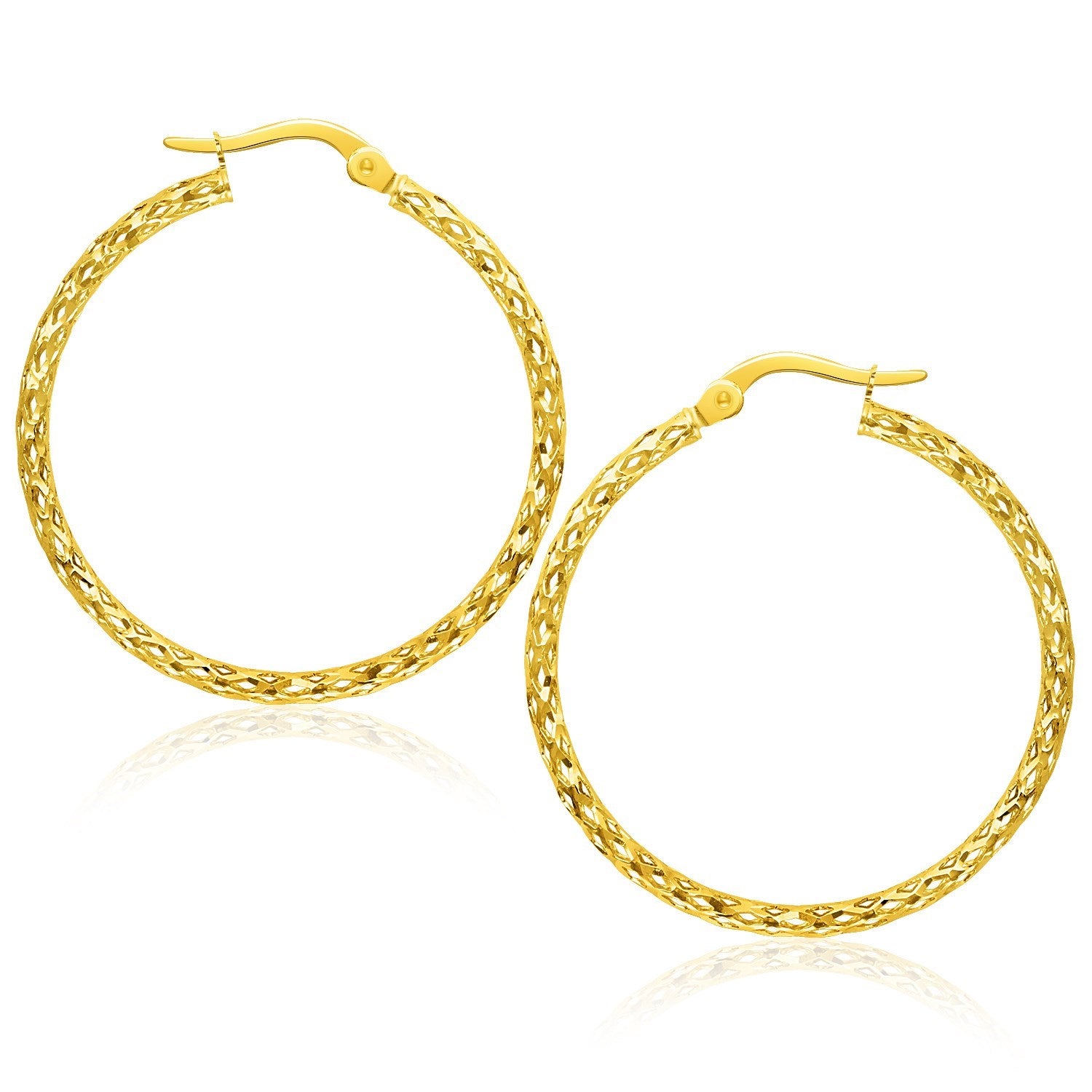 Large Textured Hoop Earrings in 10k Yellow Gold in a sleek high-contrast midnight luxury editorial style