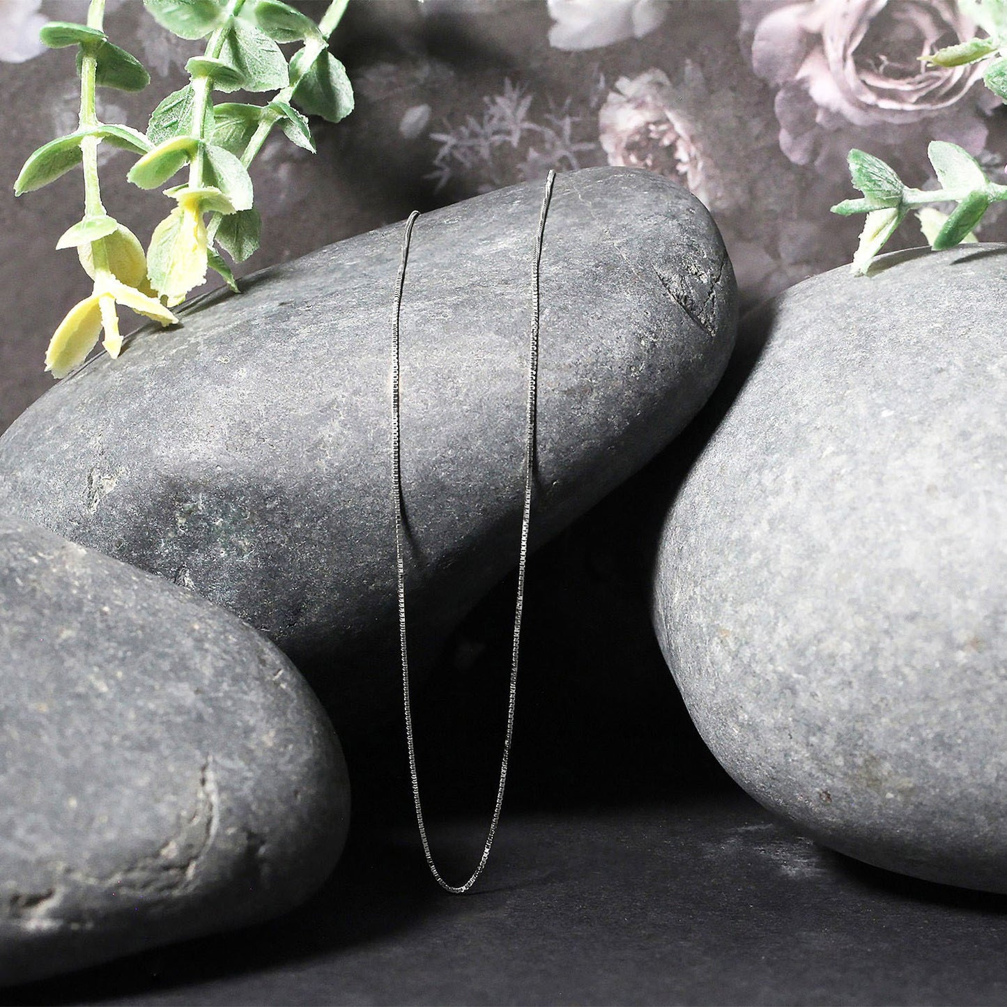 Peelerie jewelry piece in midnight luxury editorial product photo, high-contrast studio lighting