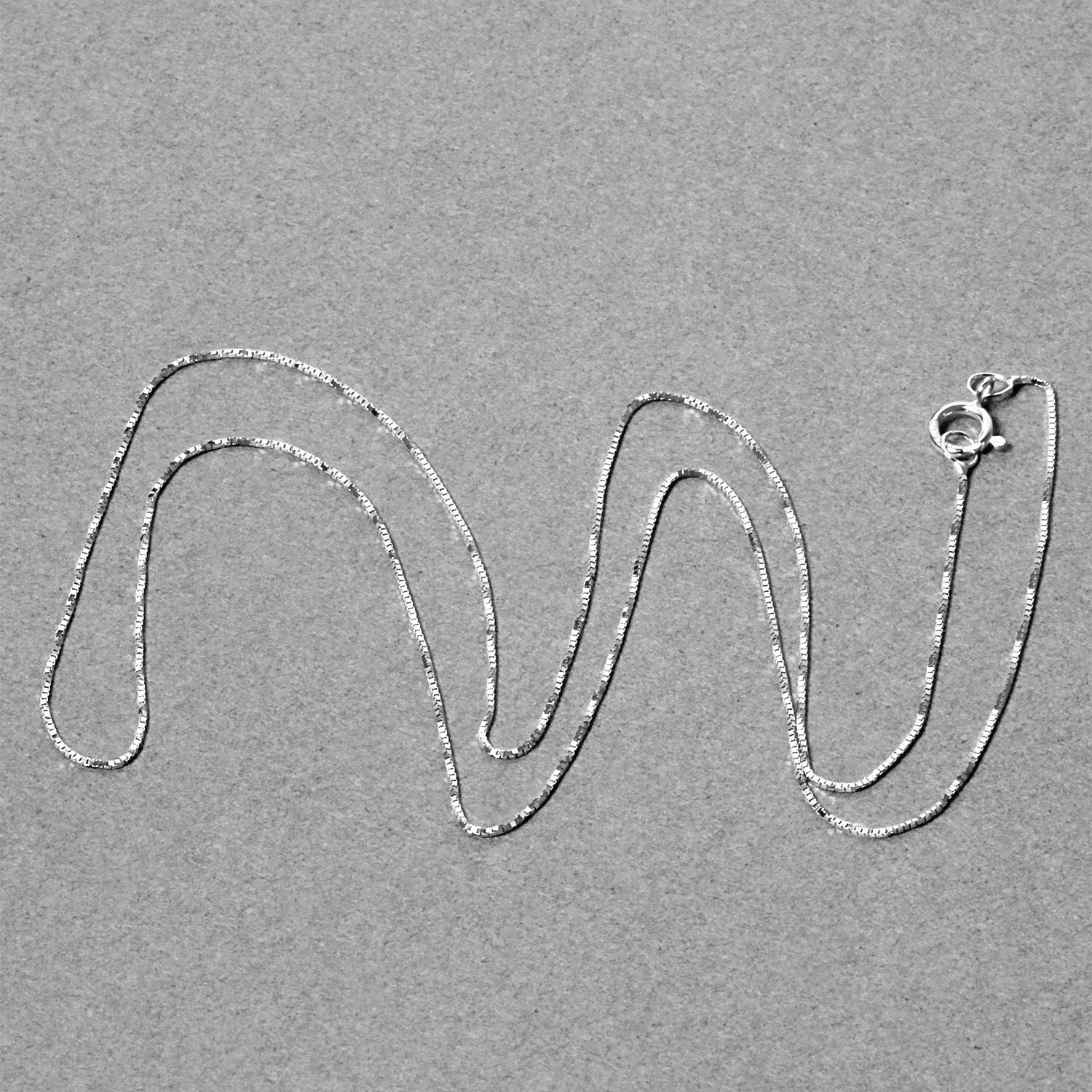 Peelerie jewelry piece in midnight luxury editorial product photo, high-contrast studio lighting