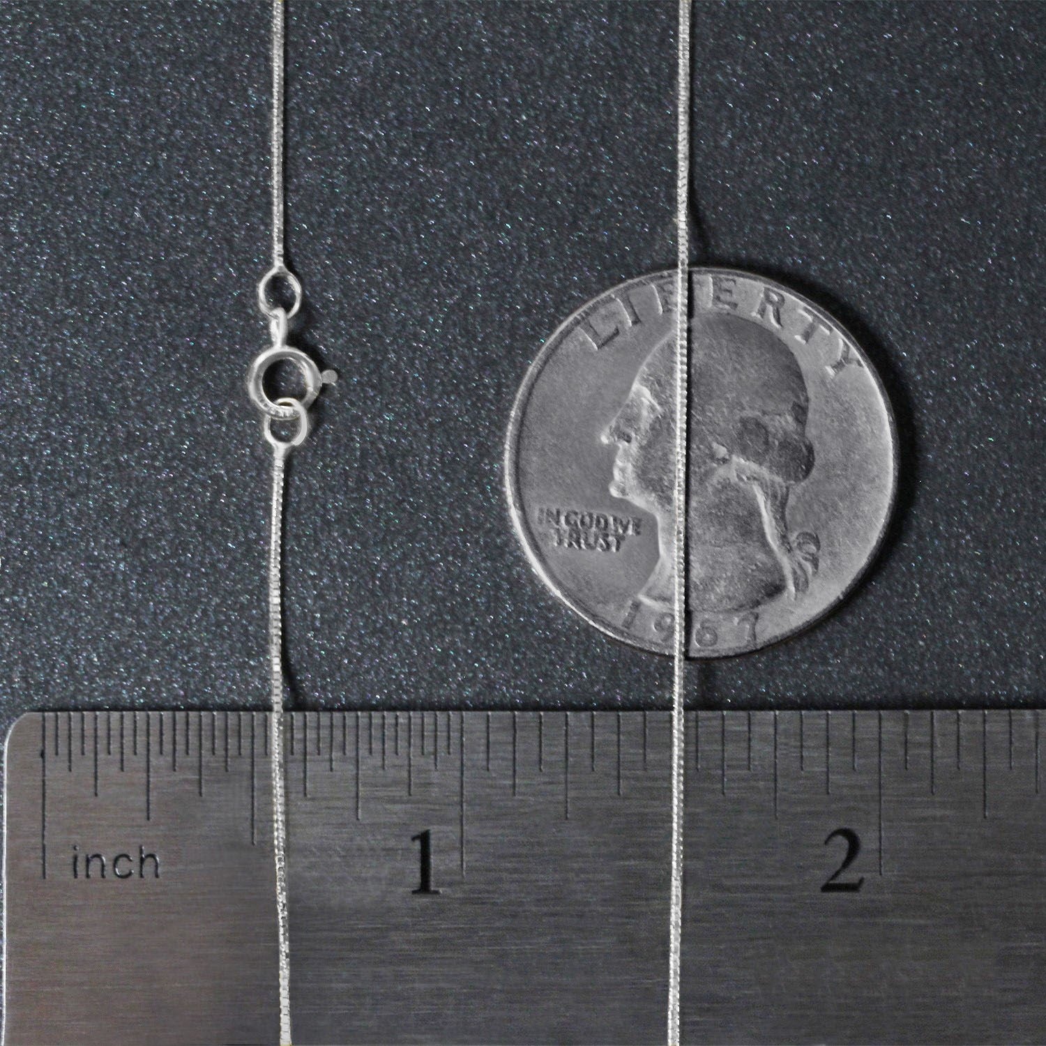 Peelerie jewelry piece in midnight luxury editorial product photo, high-contrast studio lighting