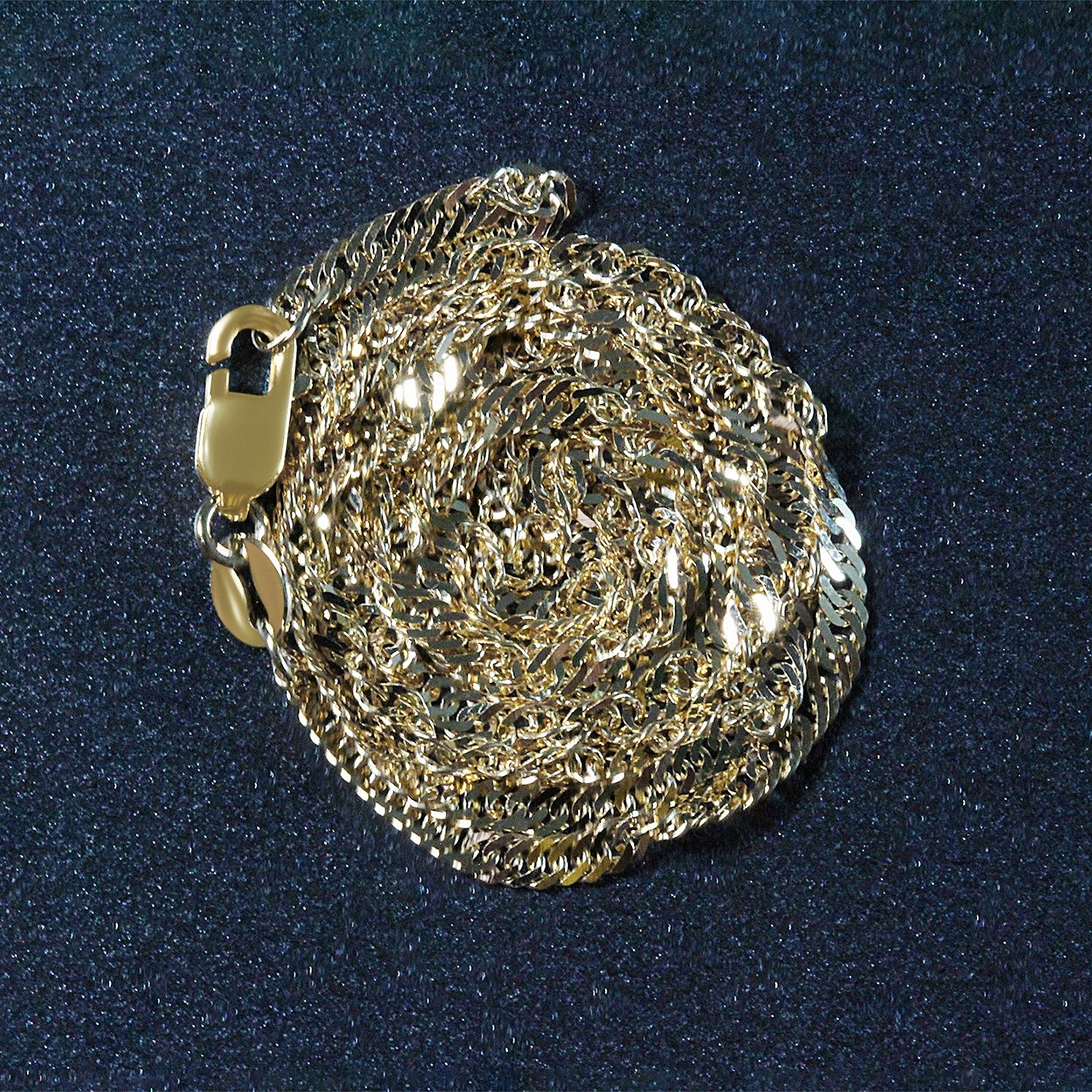 Peelerie jewelry piece in gold midnight luxury editorial product photo, high-contrast studio lighting