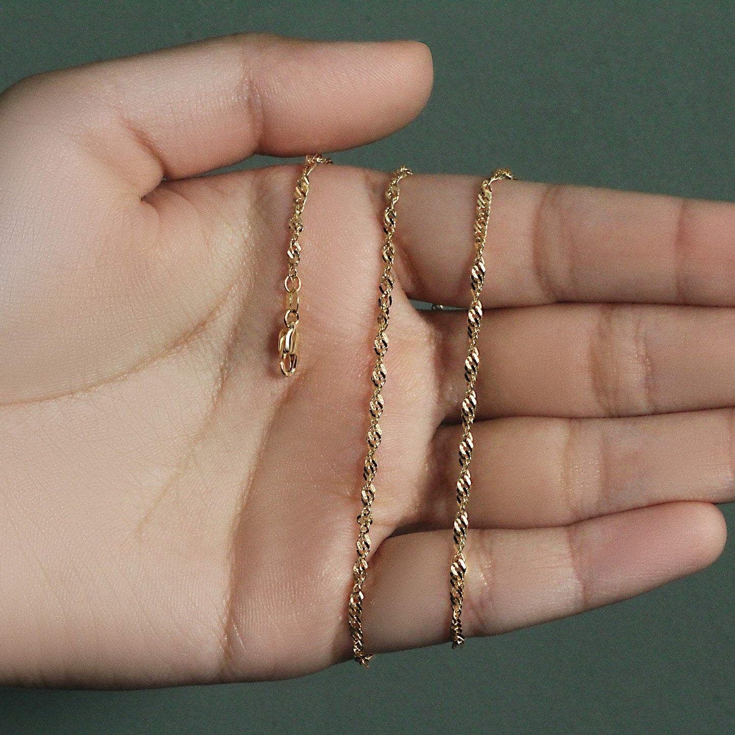 Peelerie jewelry piece in midnight luxury editorial product photo, high-contrast studio lighting