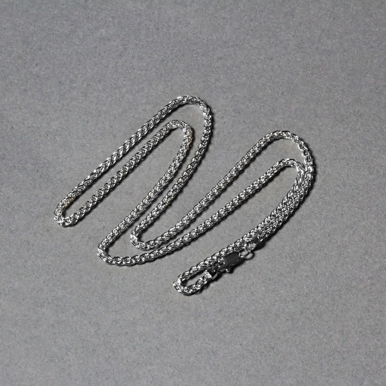 Peelerie jewelry piece in gold midnight luxury editorial product photo, high-contrast studio lighting