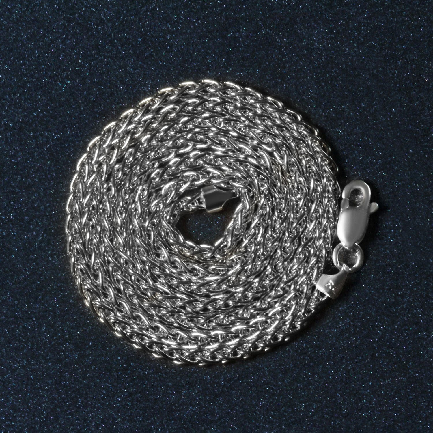 Peelerie jewelry piece in midnight luxury editorial product photo, high-contrast studio lighting