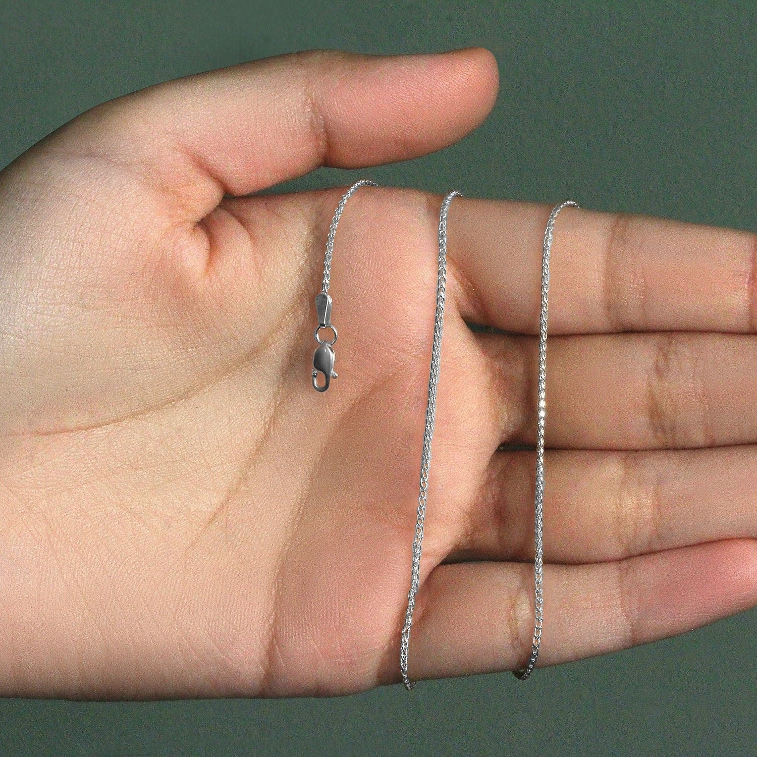 Peelerie jewelry piece in midnight luxury editorial product photo, high-contrast studio lighting