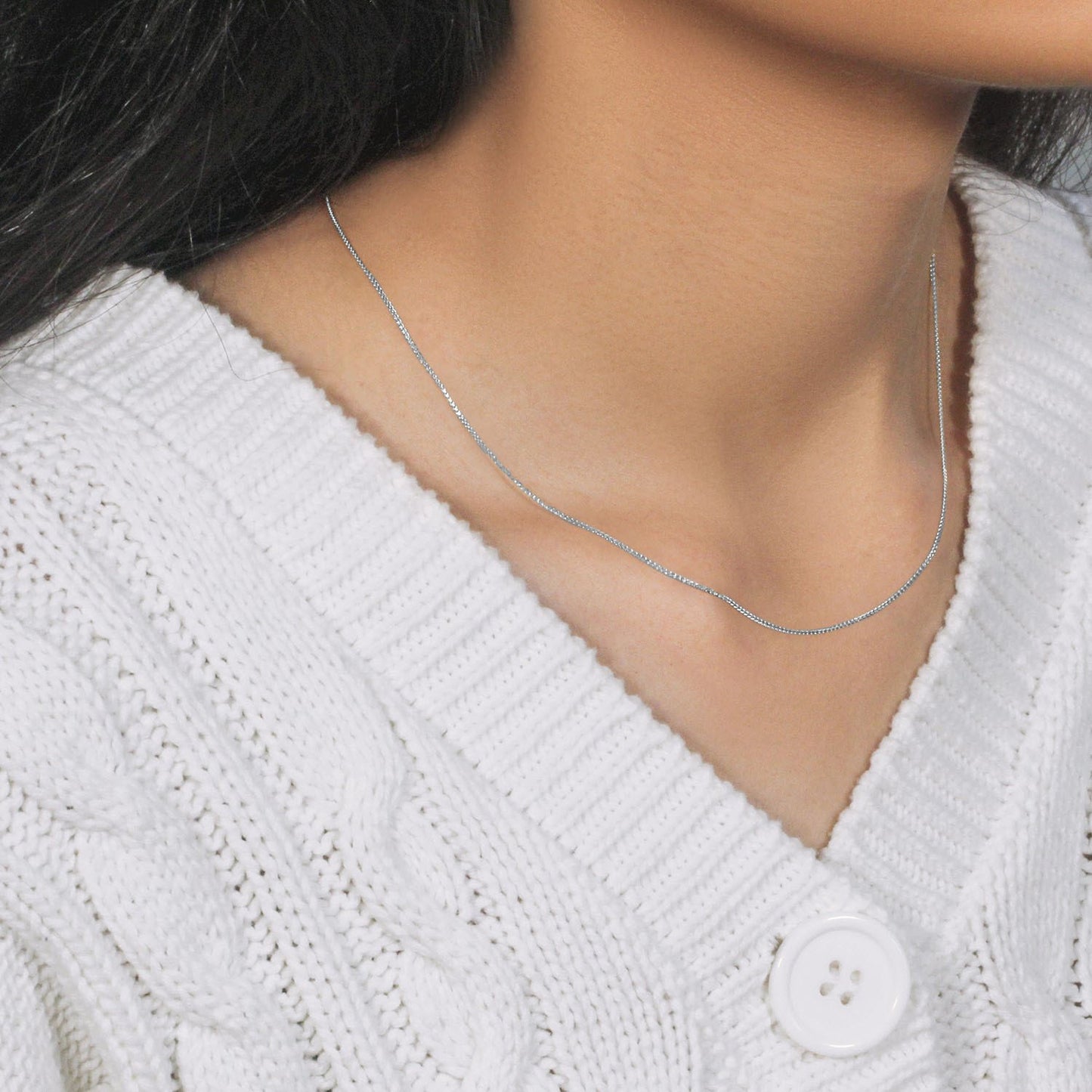 Peelerie jewelry piece in midnight luxury editorial product photo, high-contrast studio lighting