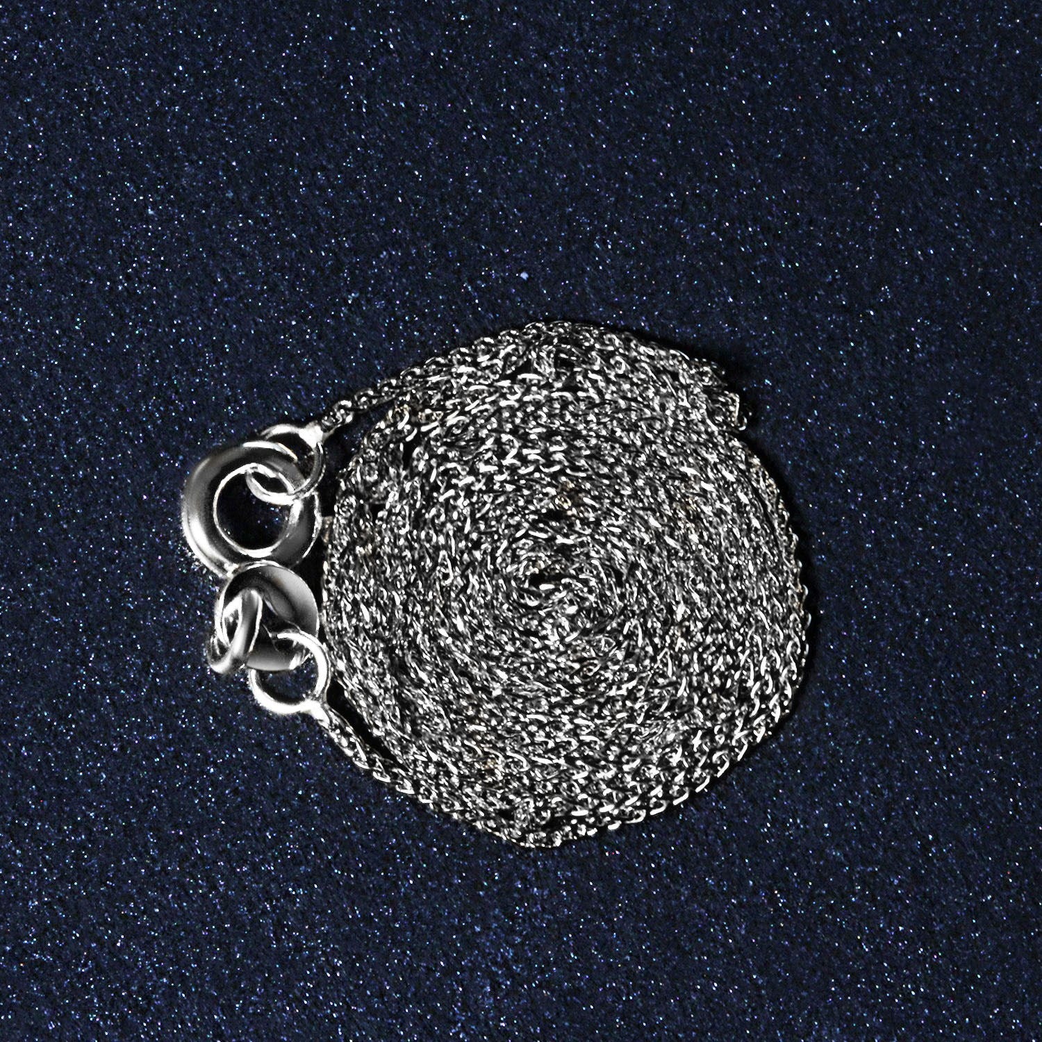 Peelerie jewelry piece in midnight luxury editorial product photo, high-contrast studio lighting