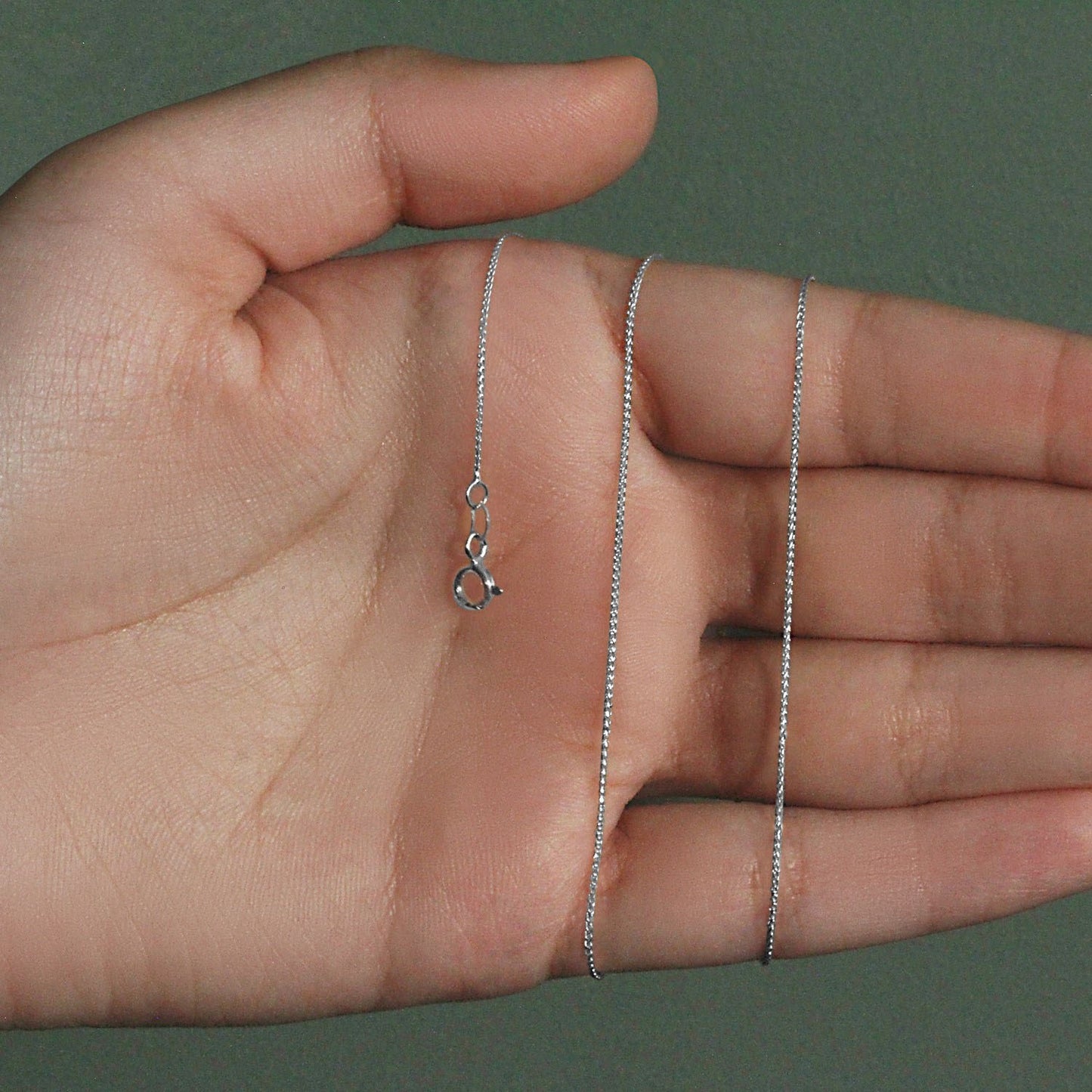 Peelerie jewelry piece in midnight luxury editorial product photo, high-contrast studio lighting