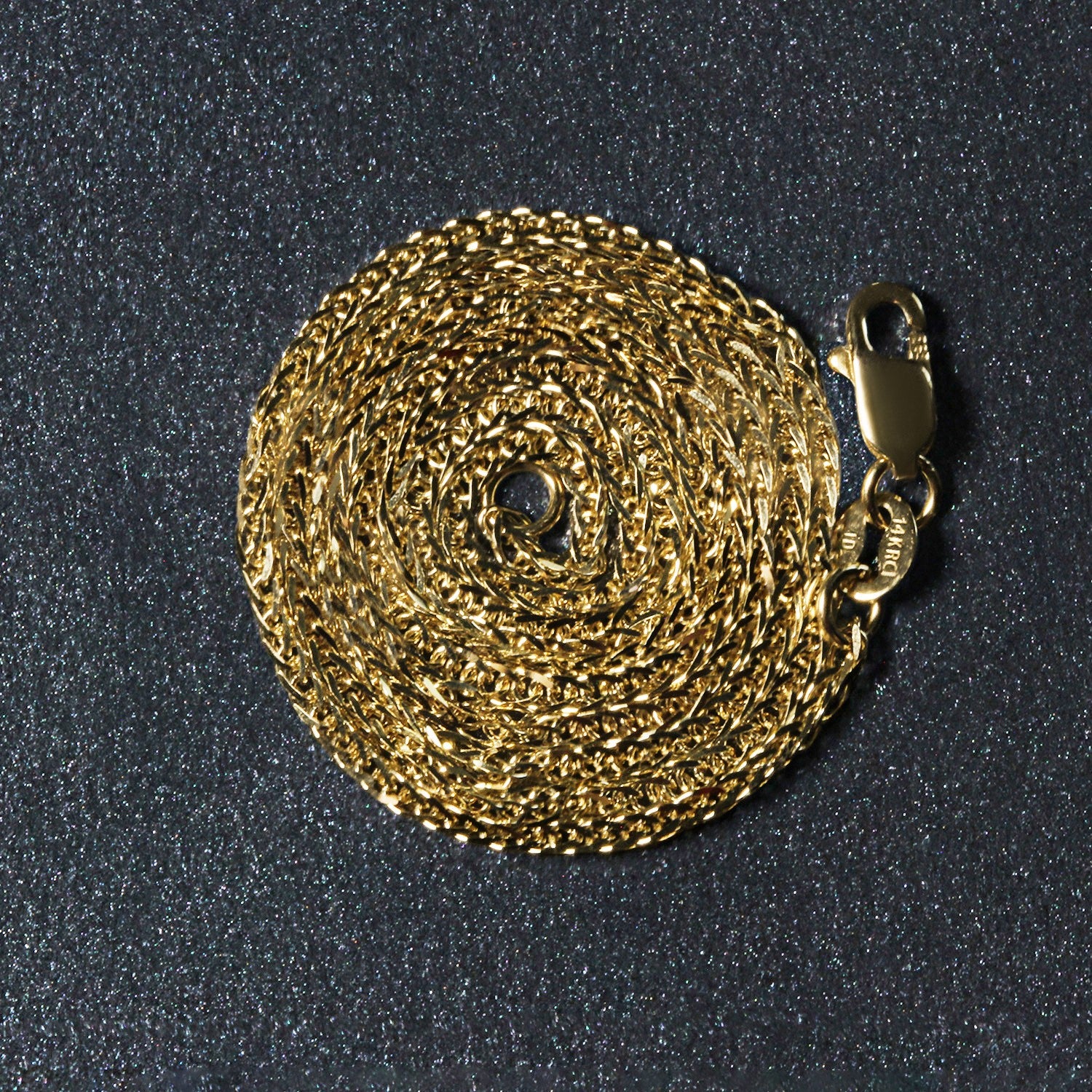 Peelerie jewelry piece in midnight luxury editorial product photo, high-contrast studio lighting