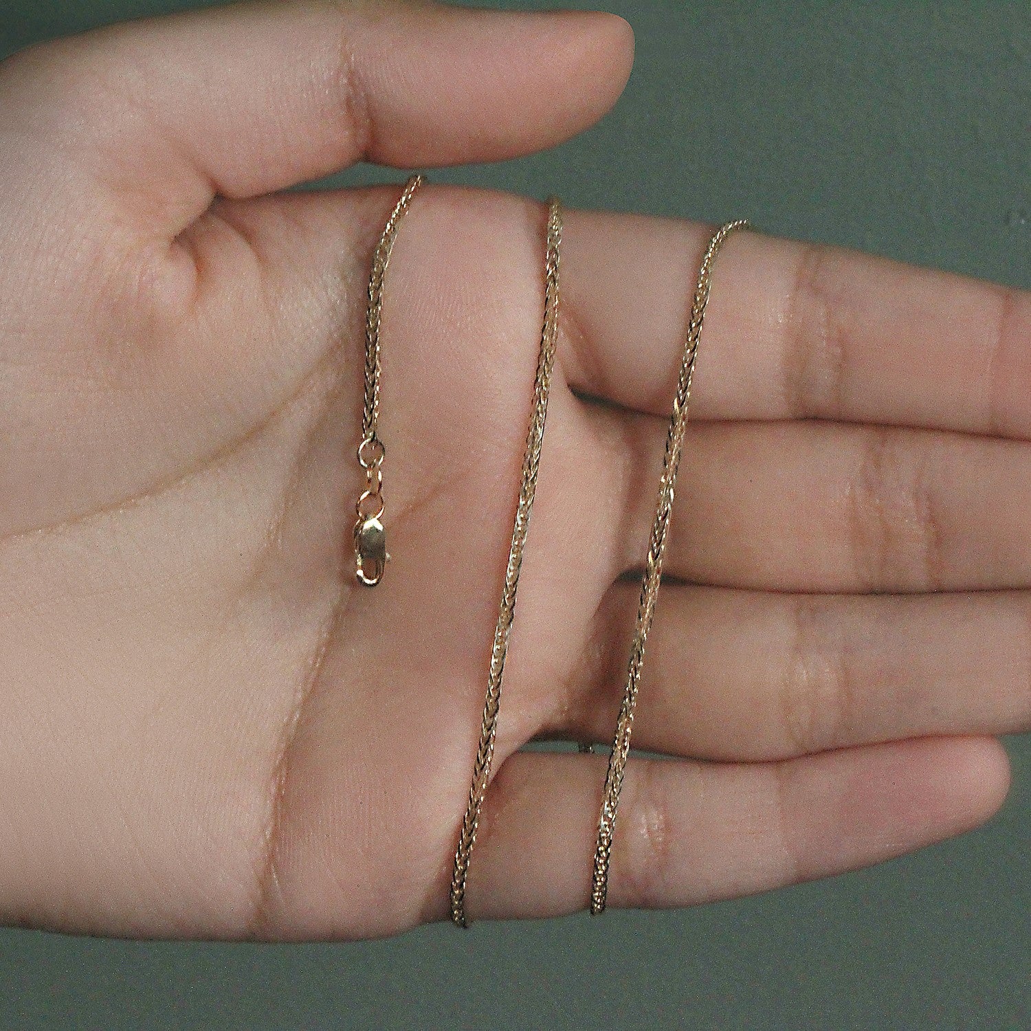 Peelerie jewelry piece in midnight luxury editorial product photo, high-contrast studio lighting